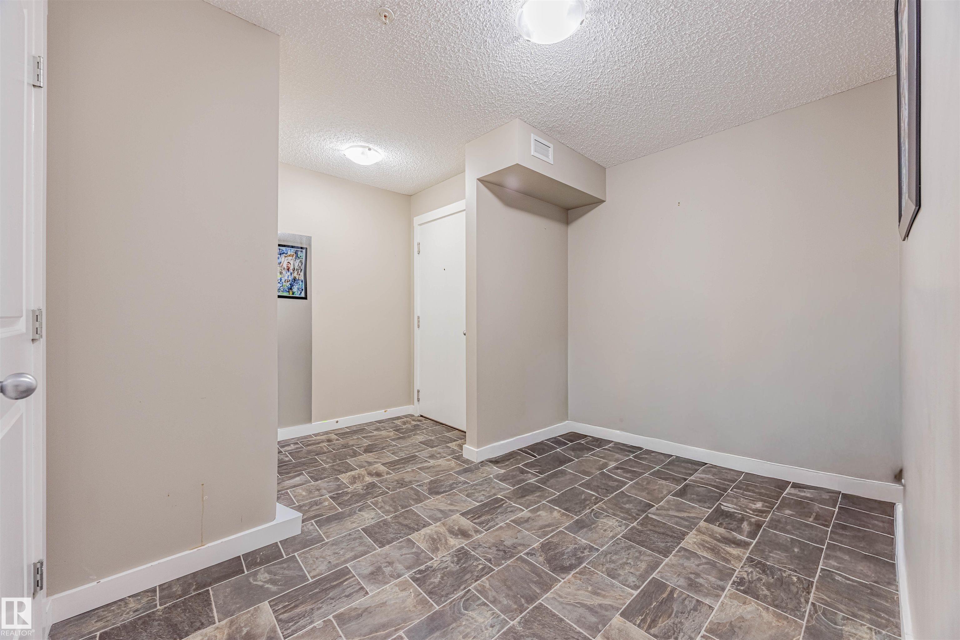 Photo 4 at 202 - 5816 Mullen Place NW, MacTaggart, Edmonton