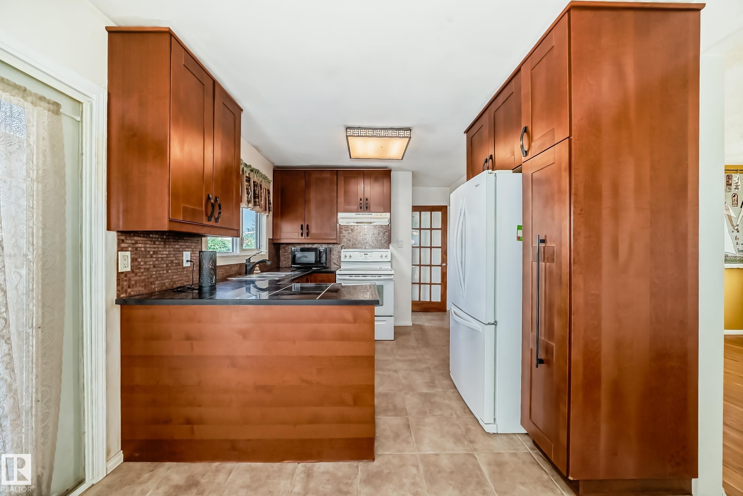 Photo 7 at 6308 144a Avenue NW, Mcleod, Edmonton