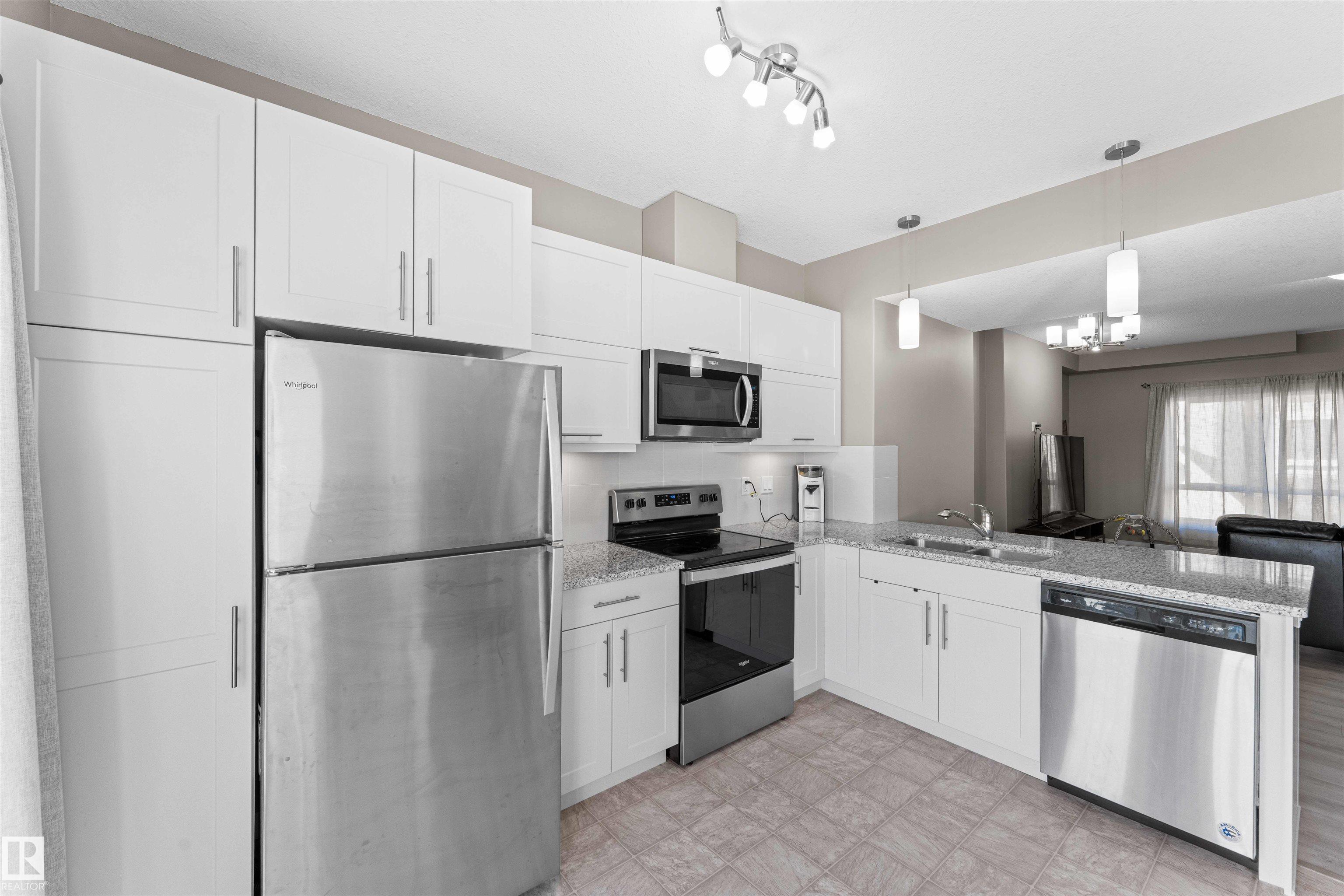 Photo 3 at 15 - 13003 132 Avenue NW, Athlone, Edmonton