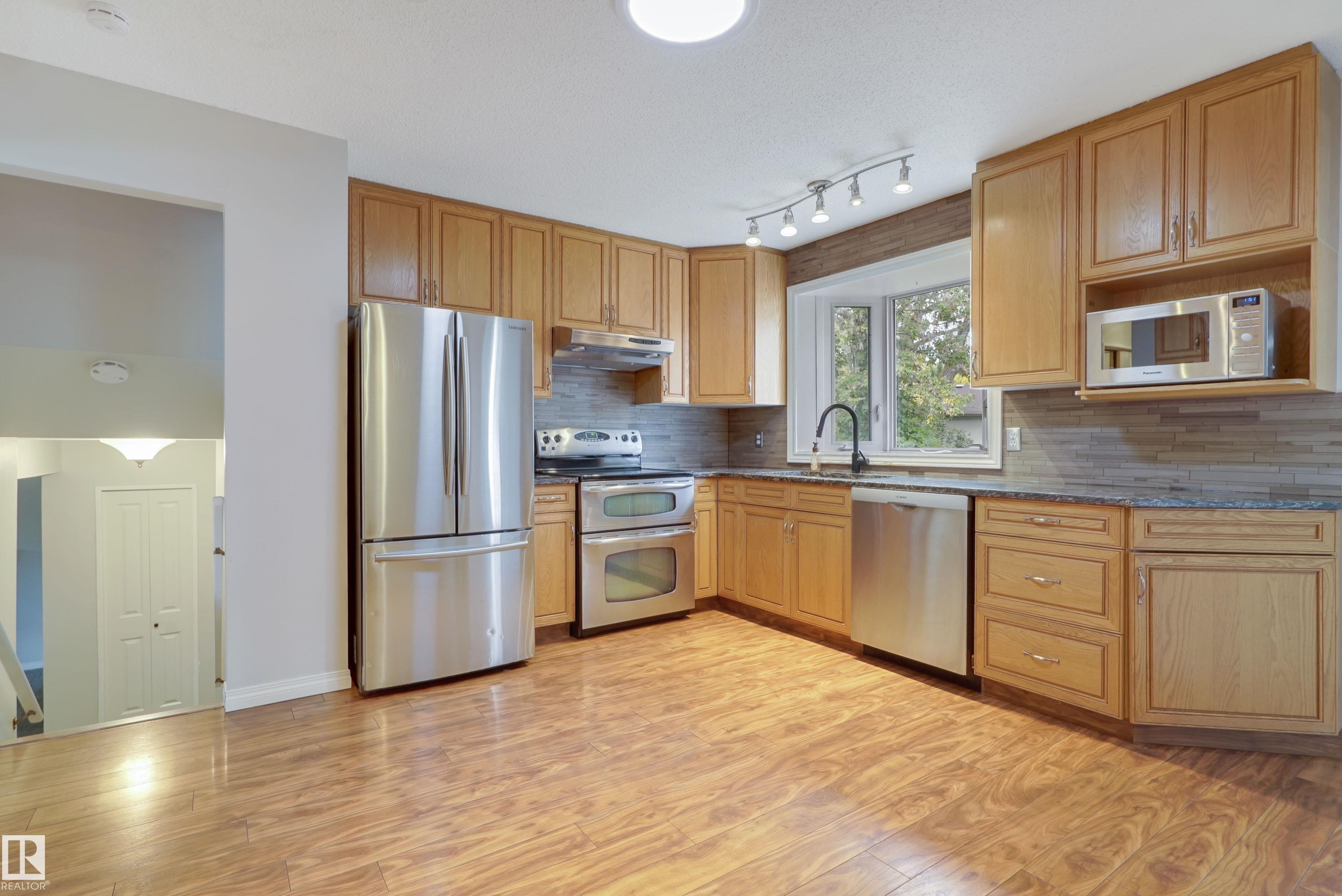 Photo 3 at 66 Flint Crescent, Forest Lawn, St. Albert