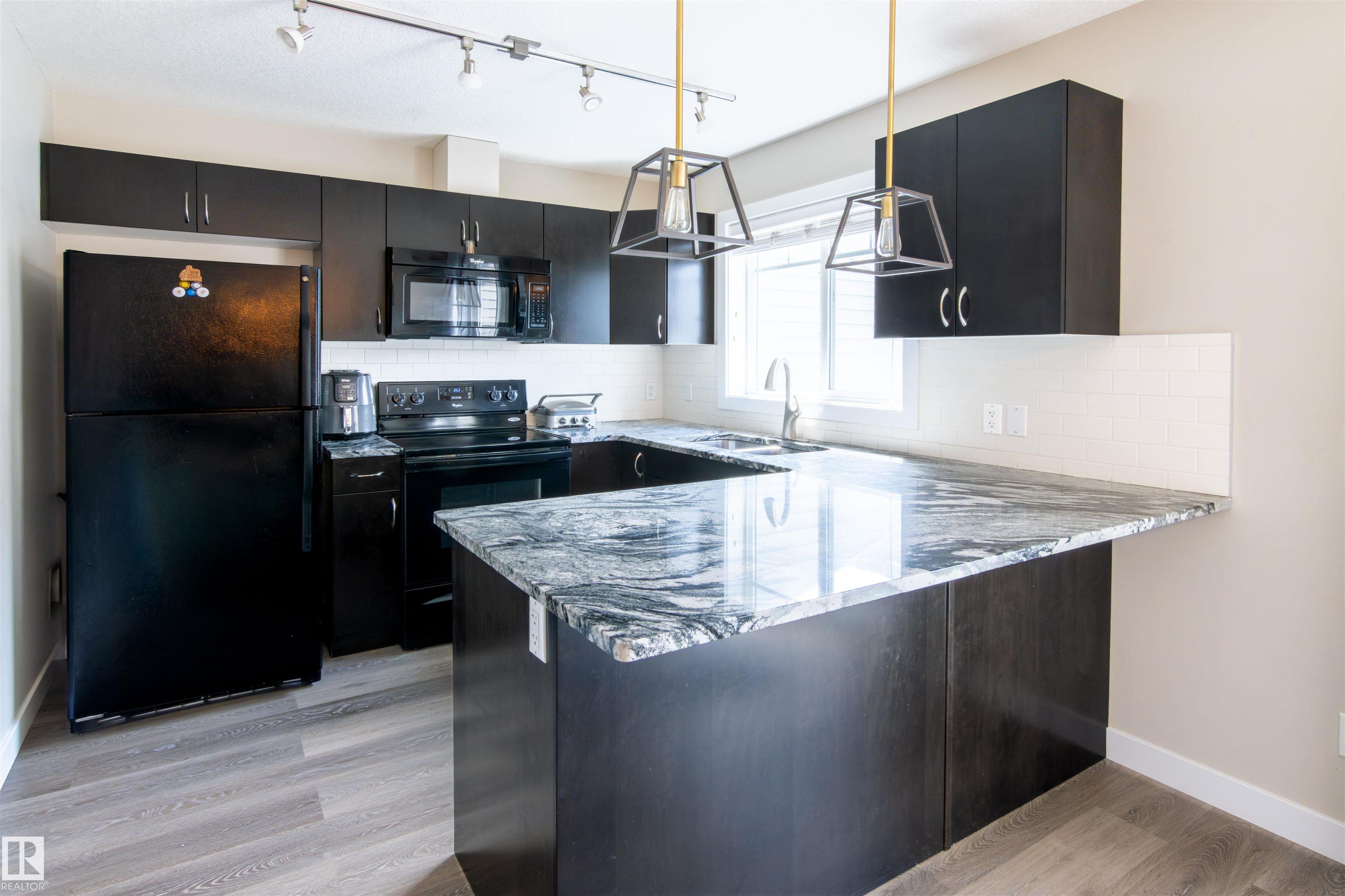 Photo 7 at #11 13810 166 Avenue NW, Carlton, Edmonton