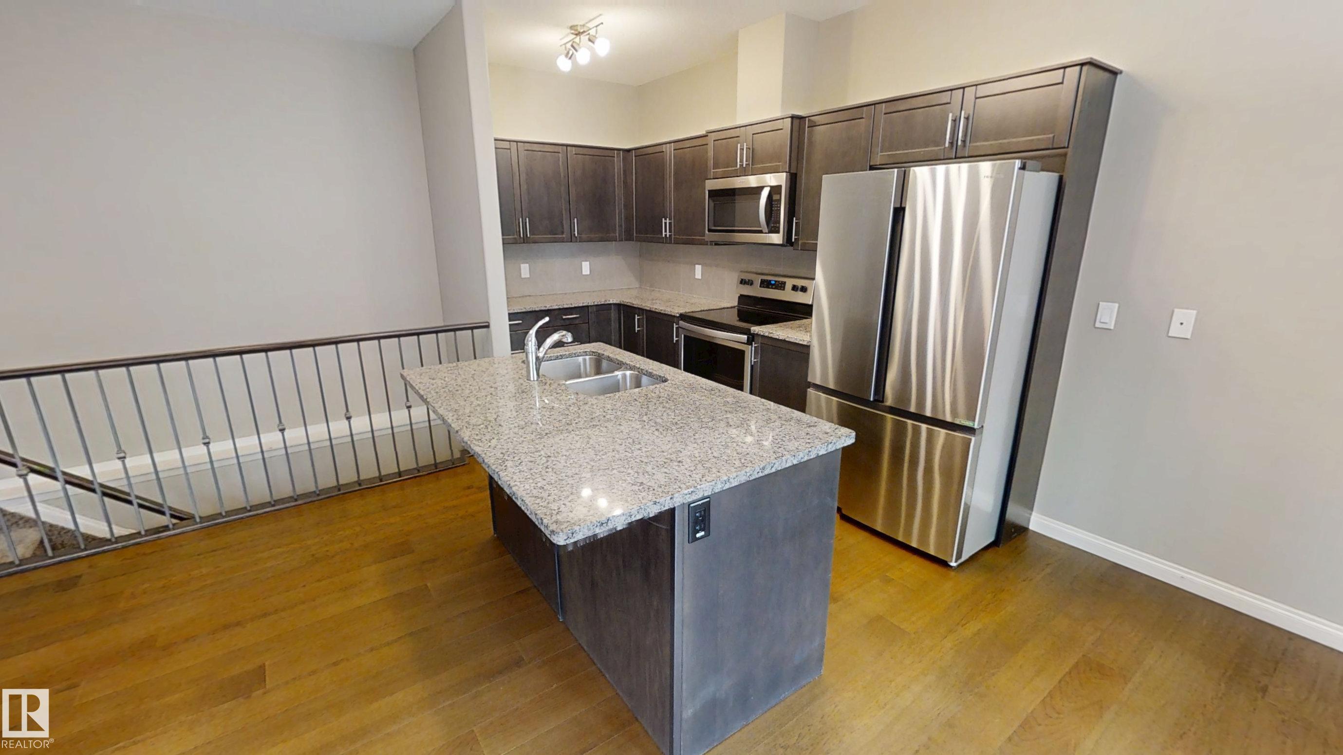 Photo 2 at 59 - 18230 104a Street NW, Elsinore, Edmonton