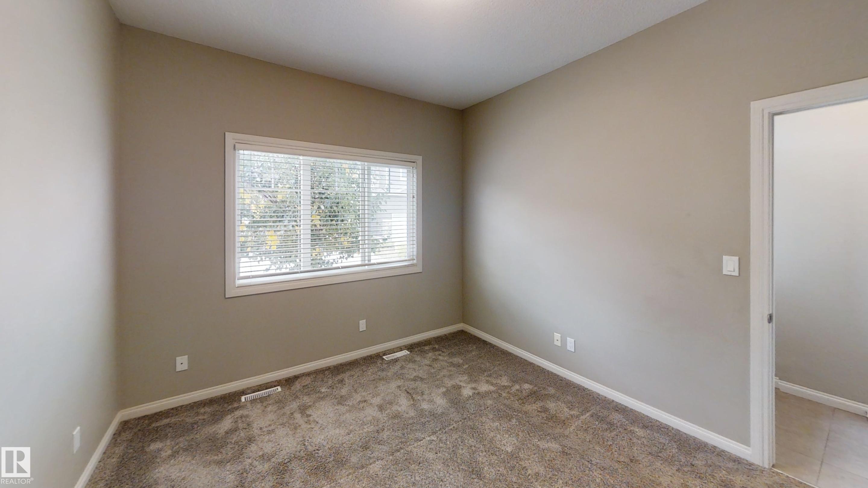 Photo 11 at 59 - 18230 104a Street NW, Elsinore, Edmonton