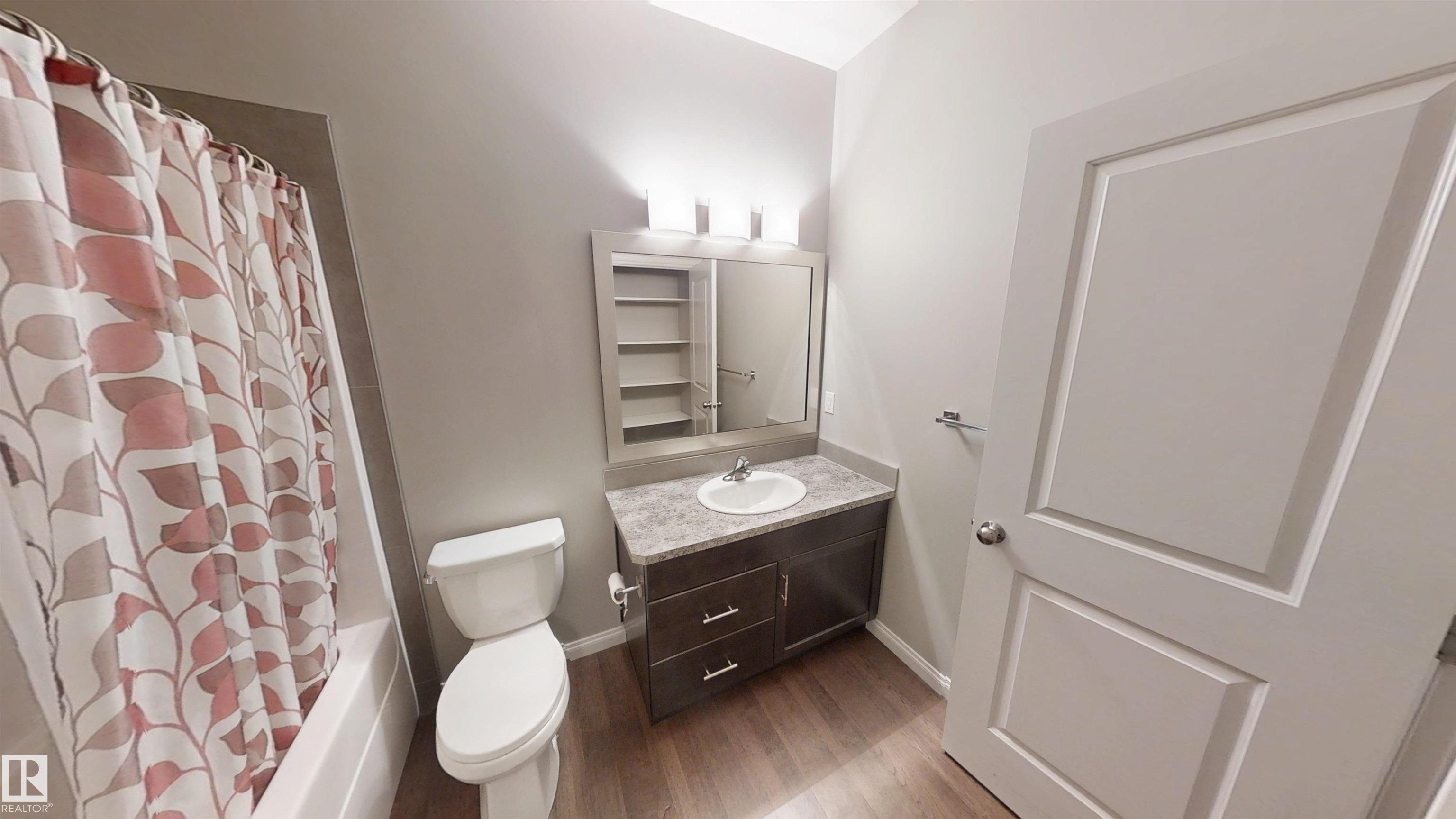Photo 12 at 59 - 18230 104a Street NW, Elsinore, Edmonton