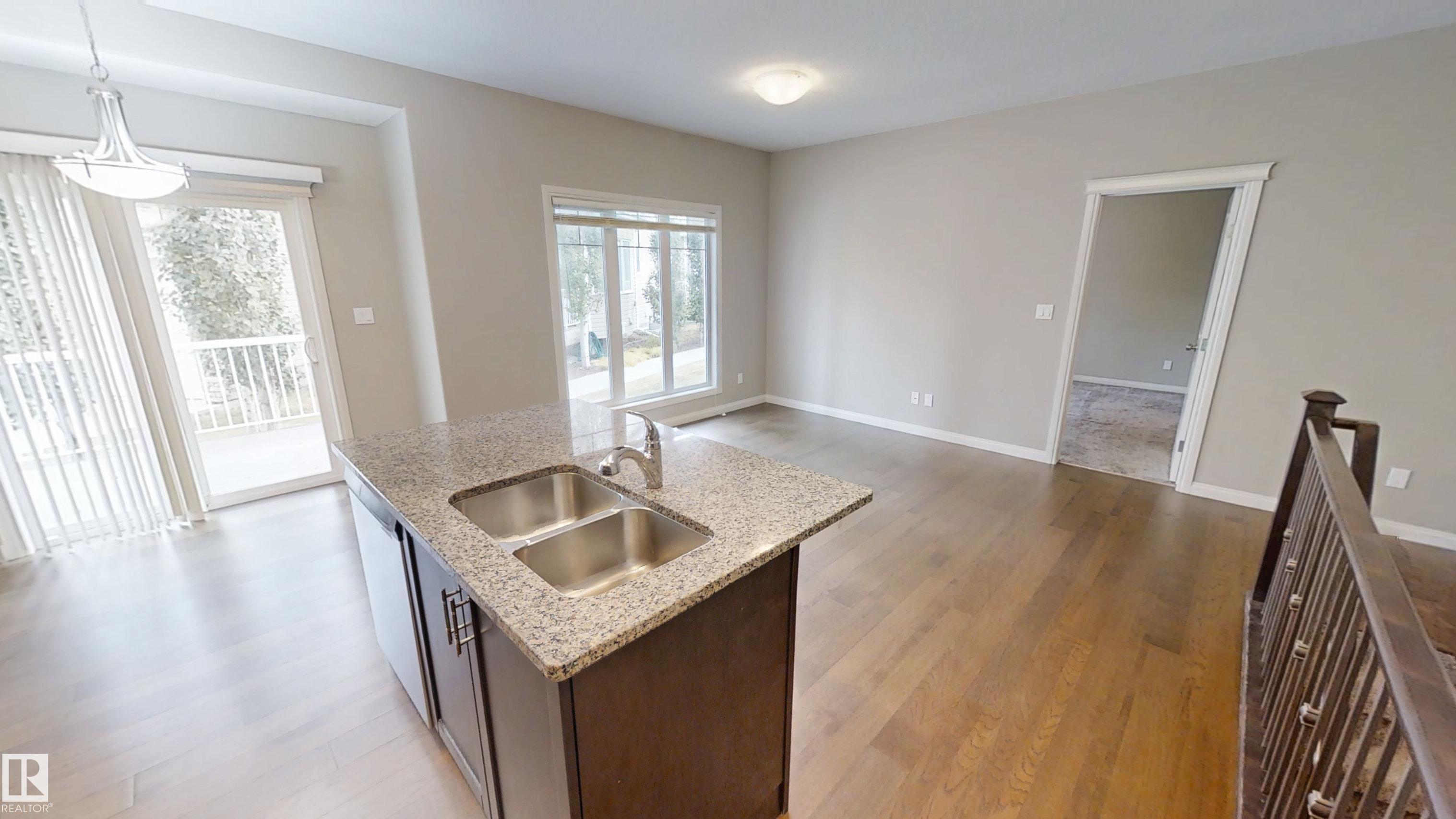 Photo 3 at 59 - 18230 104a Street NW, Elsinore, Edmonton