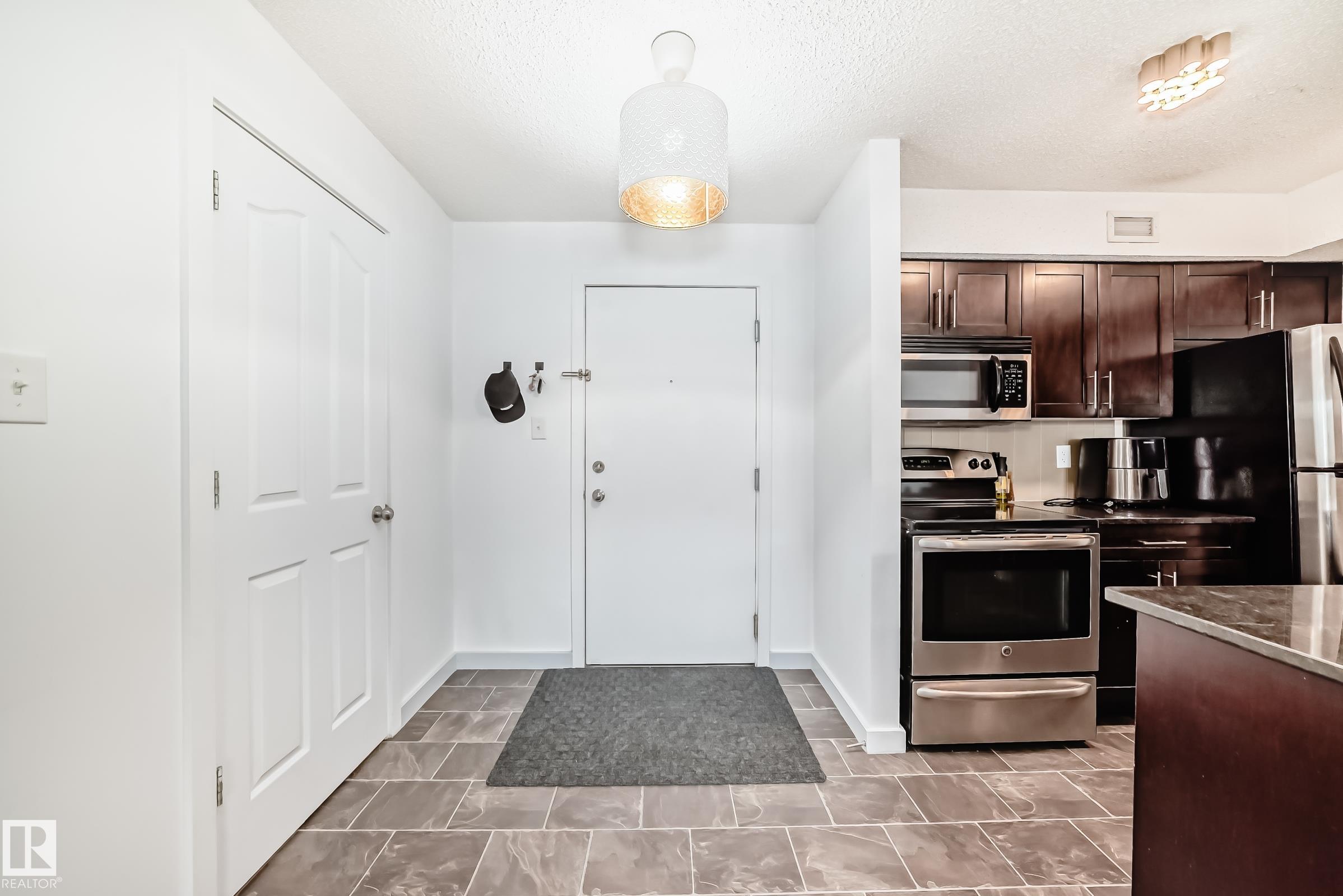 Photo 2 at 303 - 1070 Mcconachie Boulevard NW, McConachie Area, Edmonton