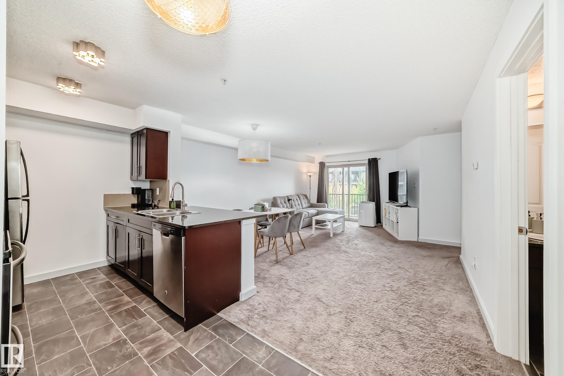 Photo 3 at 303 - 1070 Mcconachie Boulevard NW, McConachie Area, Edmonton
