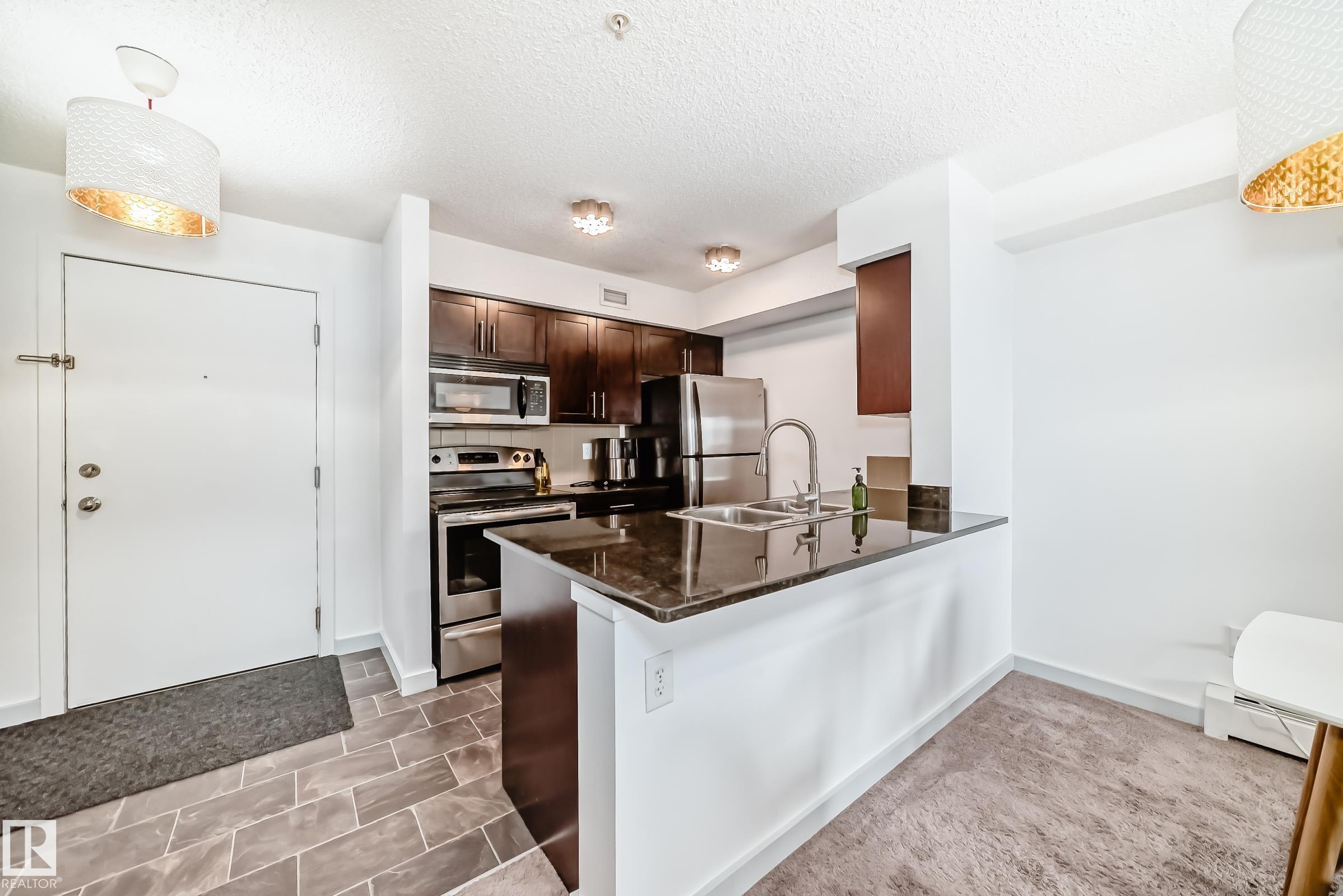 Photo 4 at 303 - 1070 Mcconachie Boulevard NW, McConachie Area, Edmonton