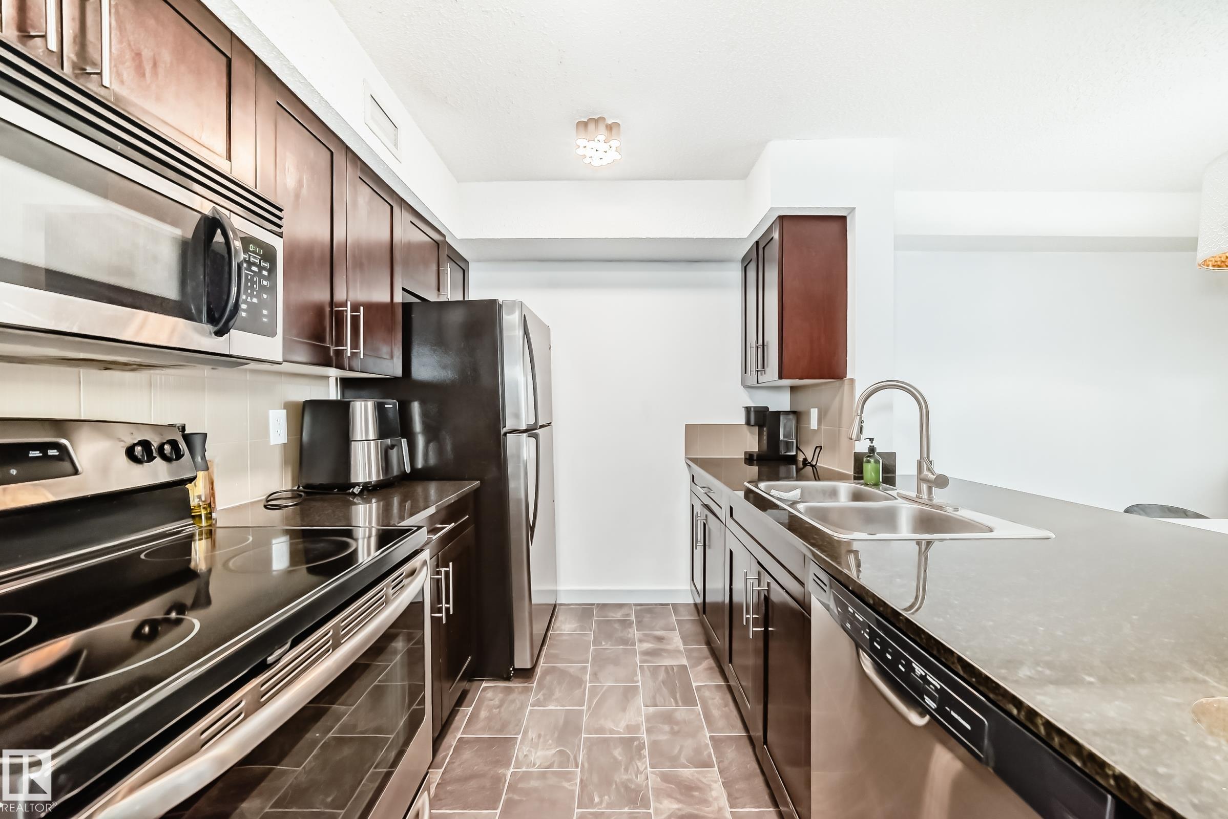 Photo 5 at 303 - 1070 Mcconachie Boulevard NW, McConachie Area, Edmonton