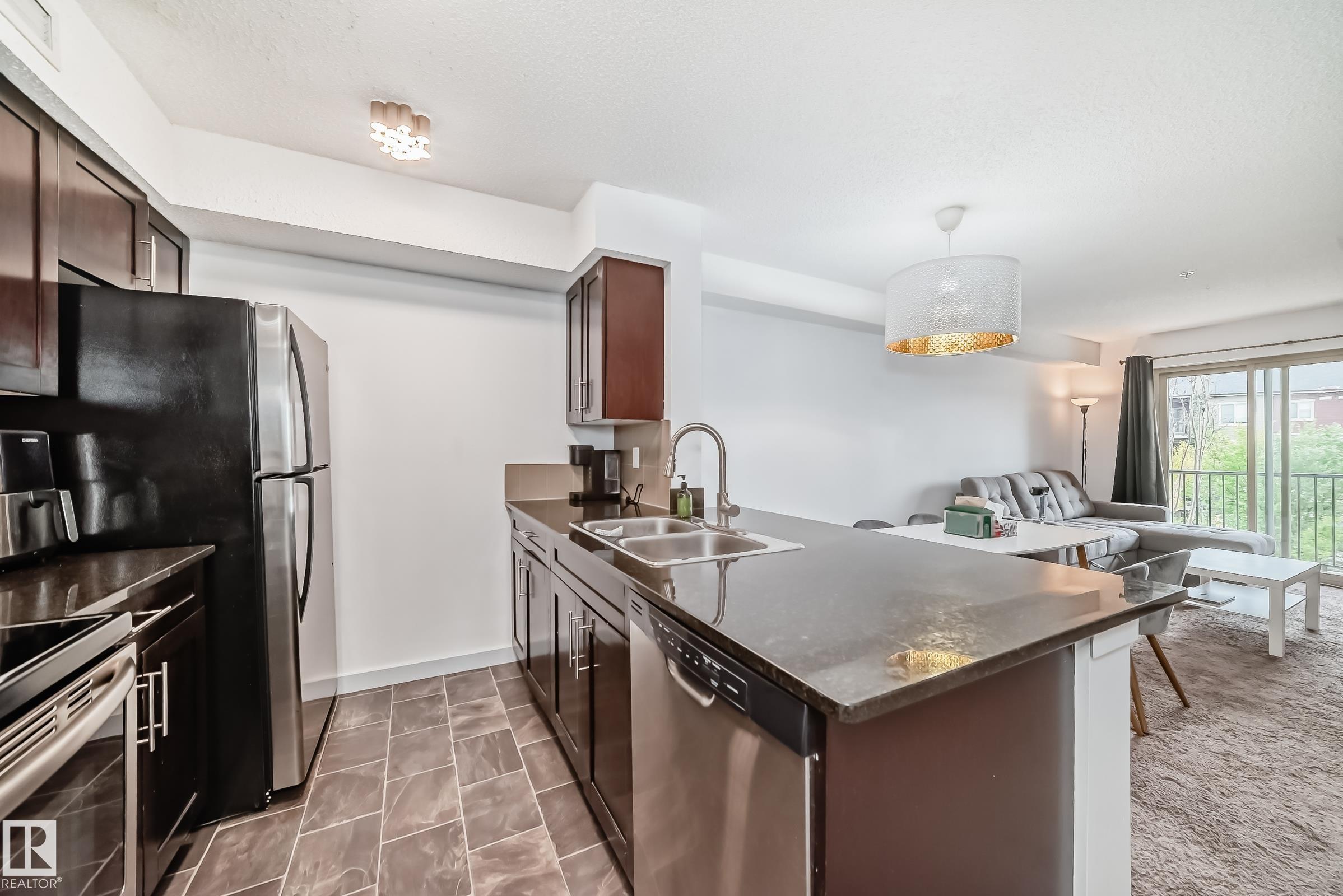 Photo 7 at 303 - 1070 Mcconachie Boulevard NW, McConachie Area, Edmonton