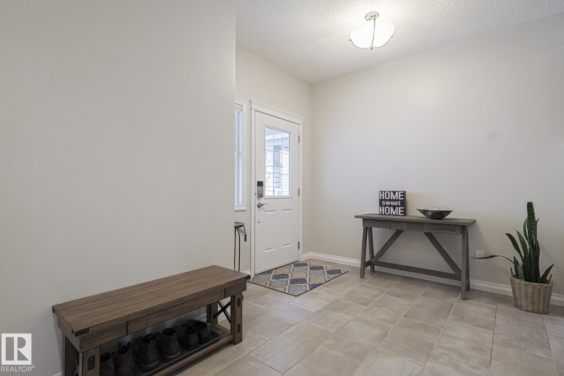 Photo 3 at 128 Sandalwood Crescent, Summerwood, Sherwood Park