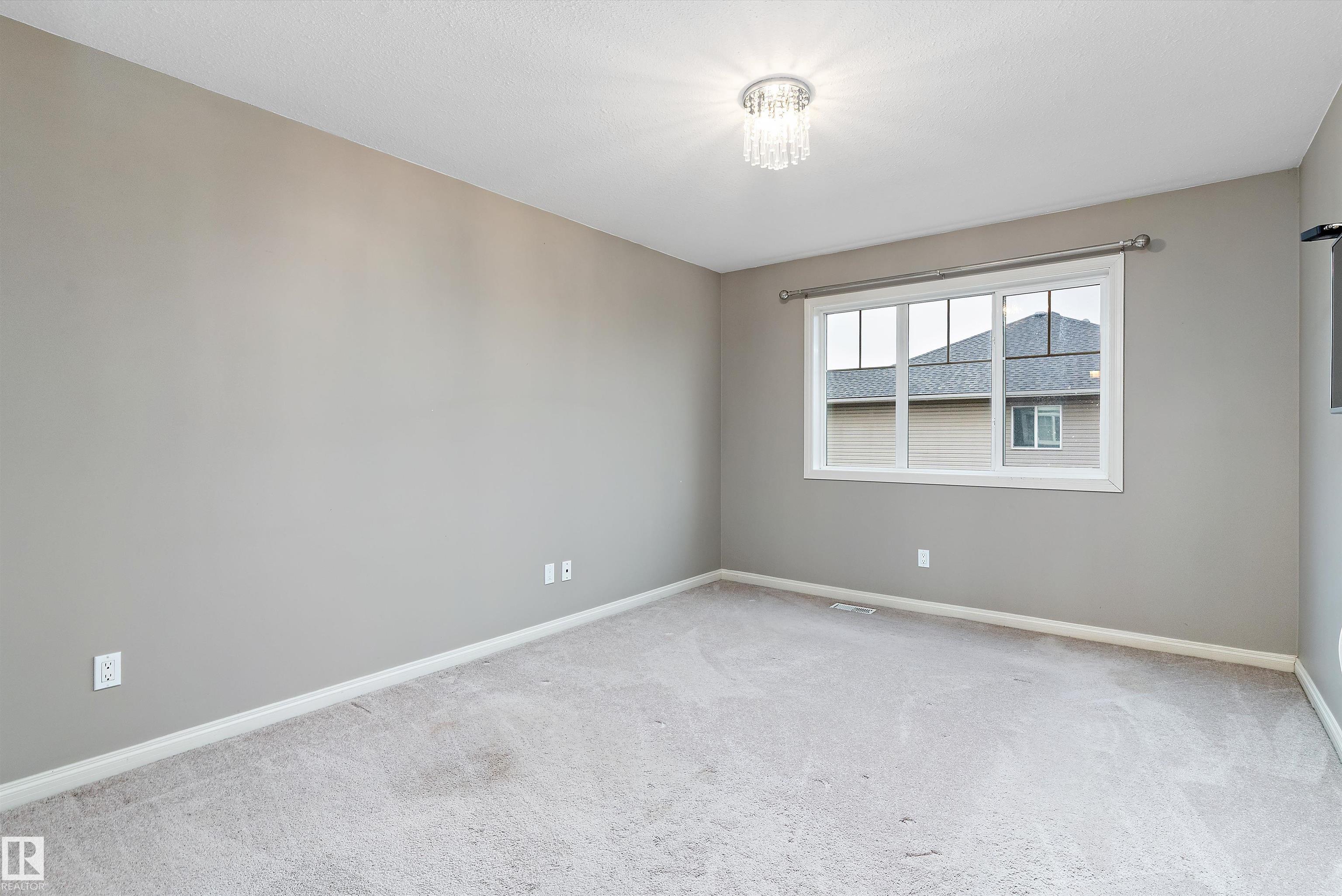 Photo 18 at 39 - 18230 104a Street NW, Elsinore, Edmonton