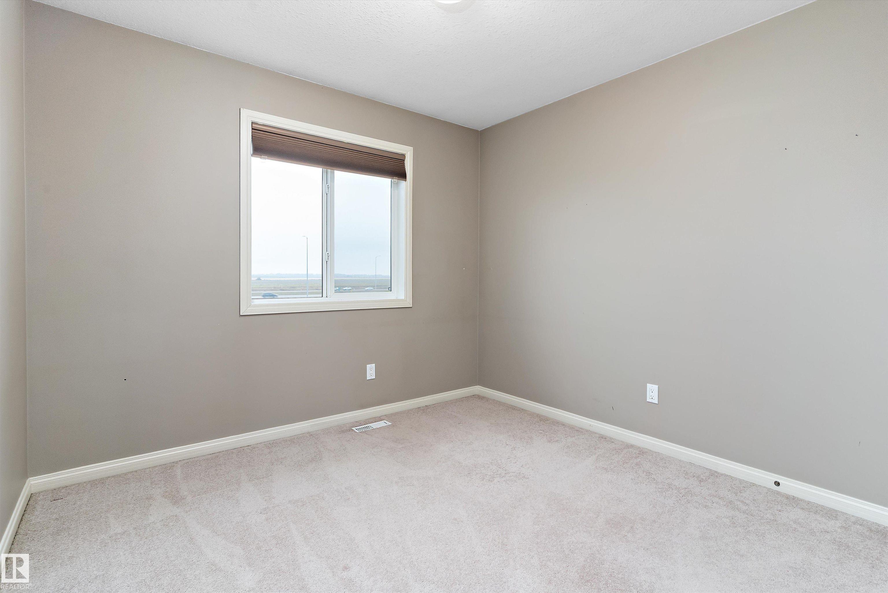 Photo 25 at 39 - 18230 104a Street NW, Elsinore, Edmonton