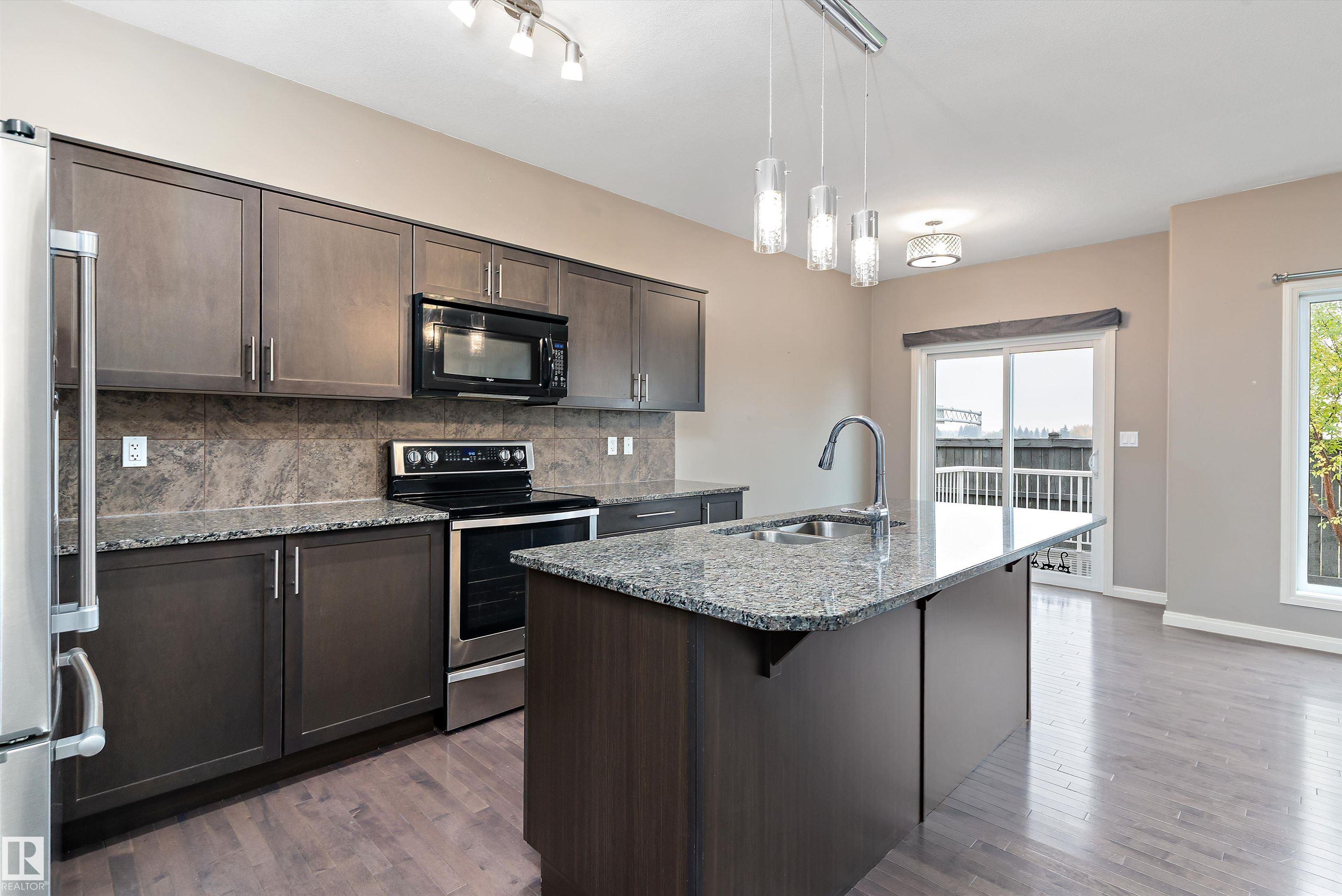 Photo 6 at 39 - 18230 104a Street NW, Elsinore, Edmonton