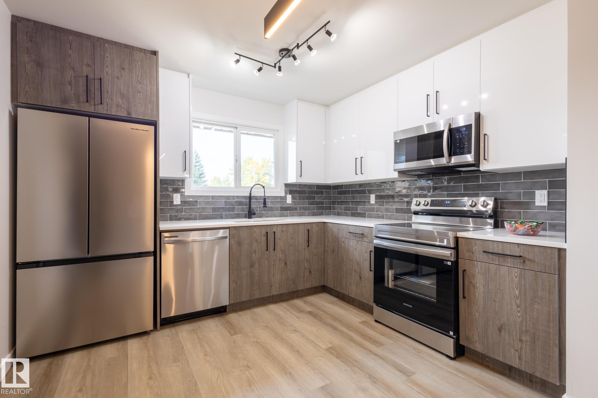 Photo 11 at 14618 25 Street NW, Fraser, Edmonton
