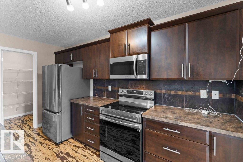 Photo 9 at 84 Calvert Wynd, South Pointe, Fort Saskatchewan
