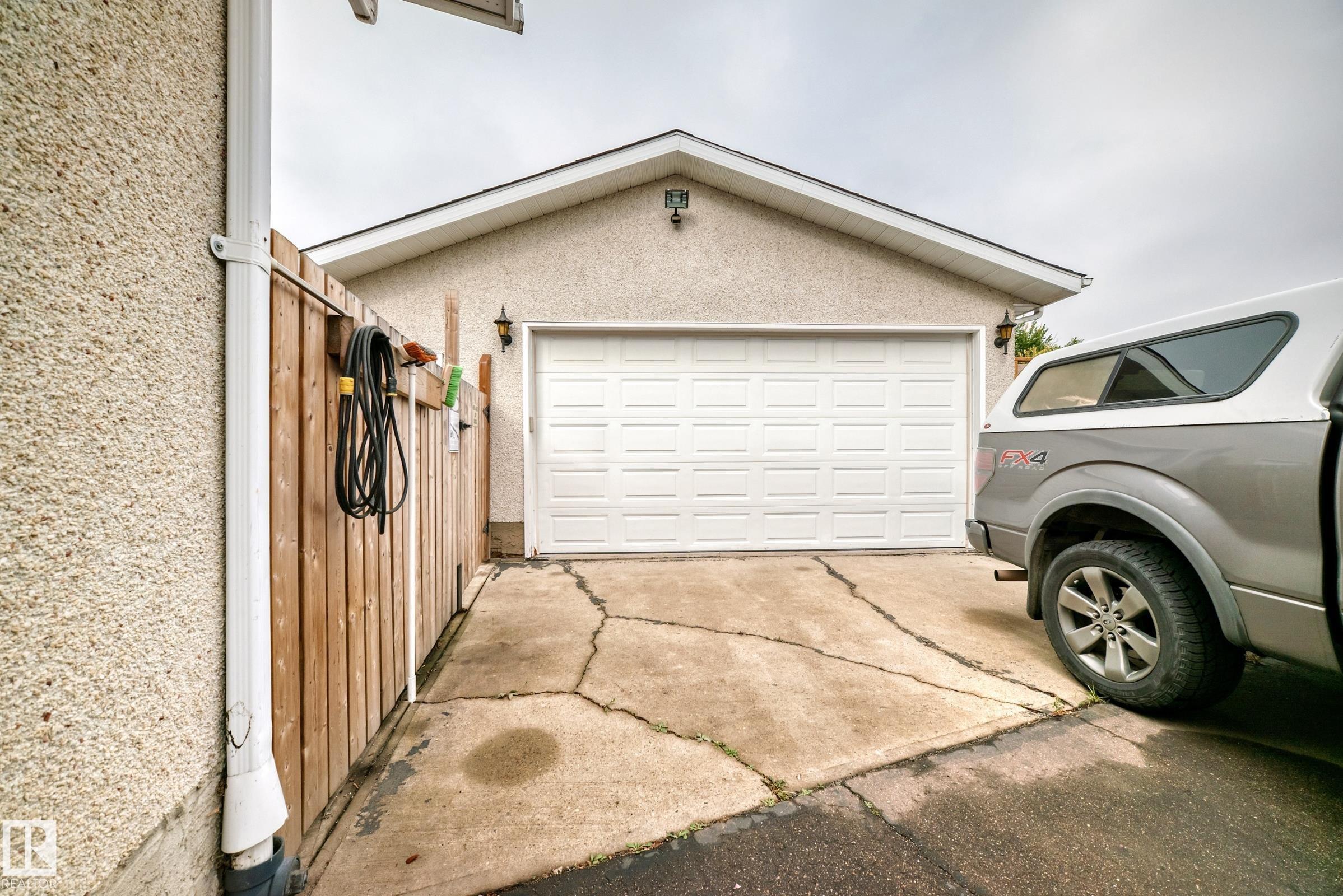 Photo 2 at 13046 32a Street NW, Belmont, Edmonton