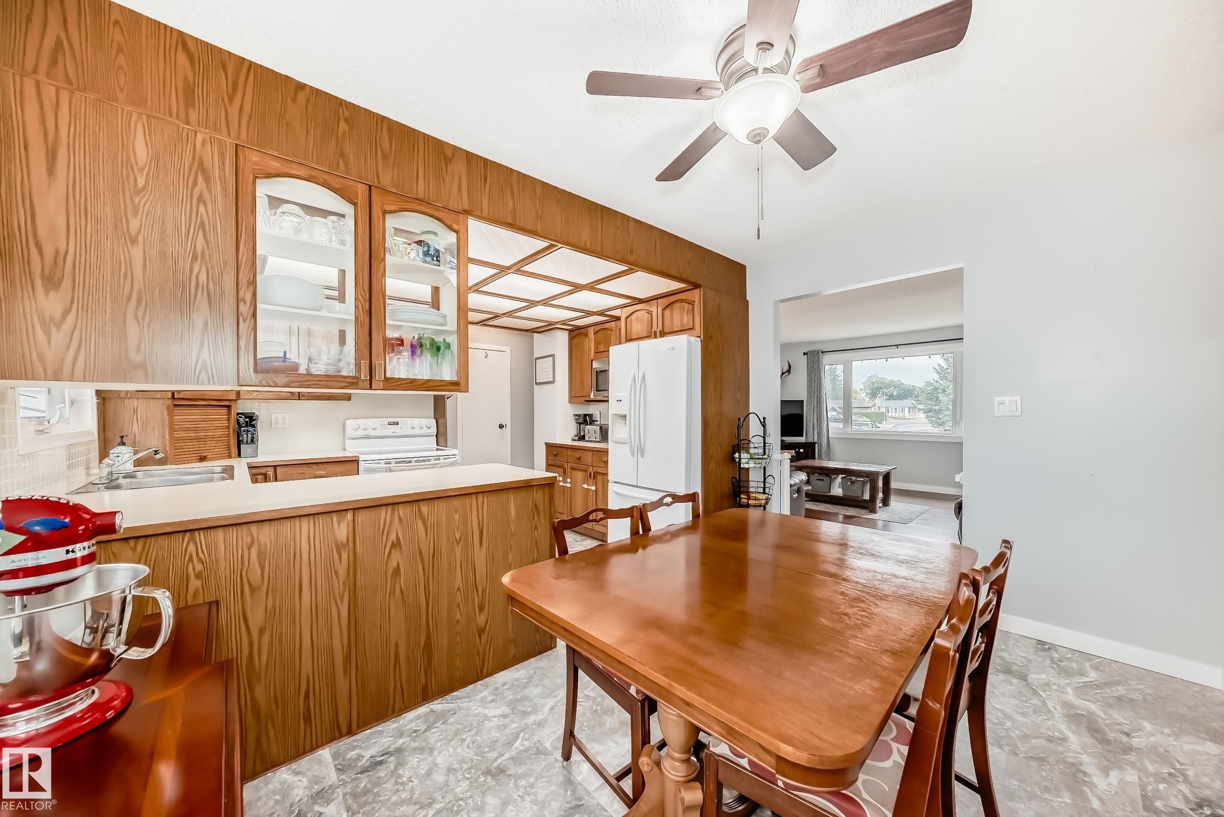 Photo 13 at 13046 32a Street NW, Belmont, Edmonton