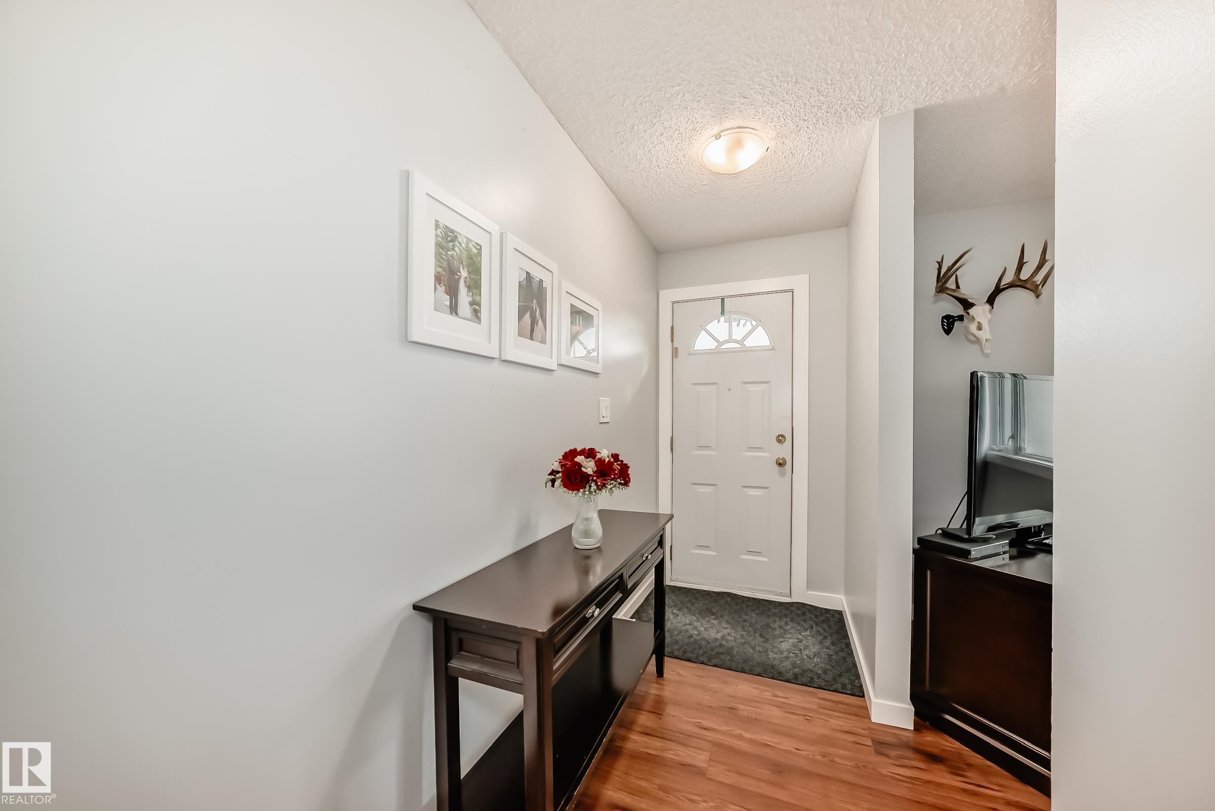 Photo 3 at 13046 32a Street NW, Belmont, Edmonton
