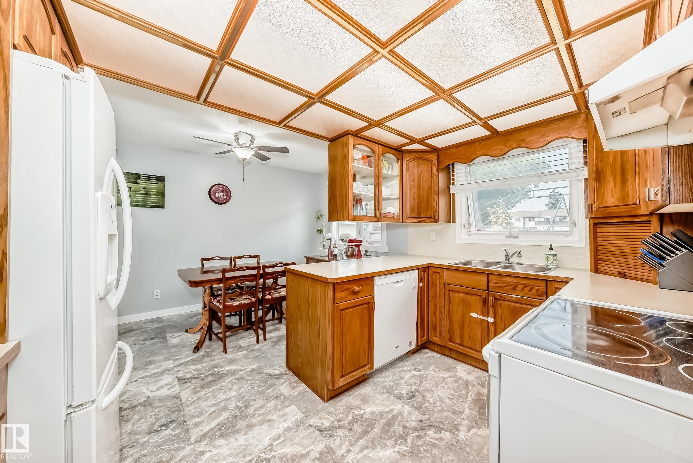 Photo 5 at 13046 32a Street NW, Belmont, Edmonton