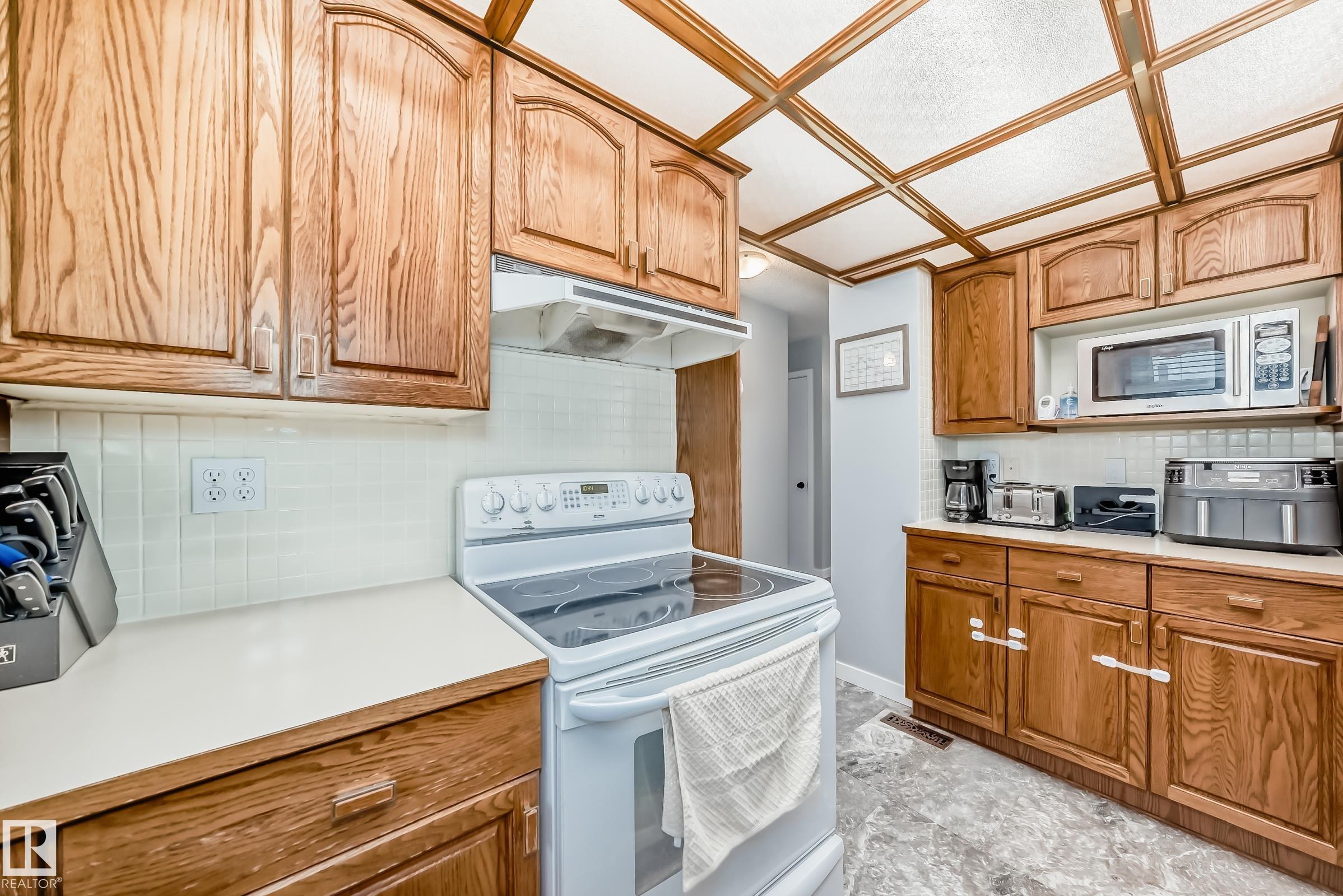 Photo 8 at 13046 32a Street NW, Belmont, Edmonton