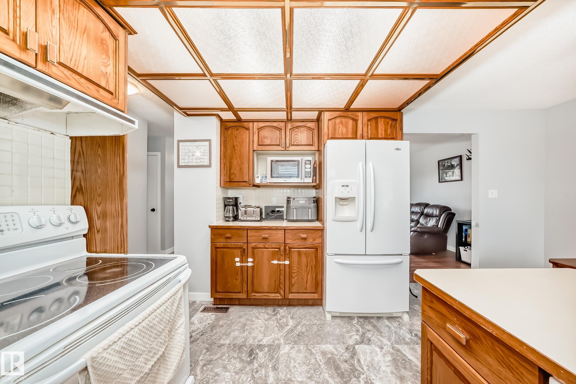 Photo 9 at 13046 32a Street NW, Belmont, Edmonton