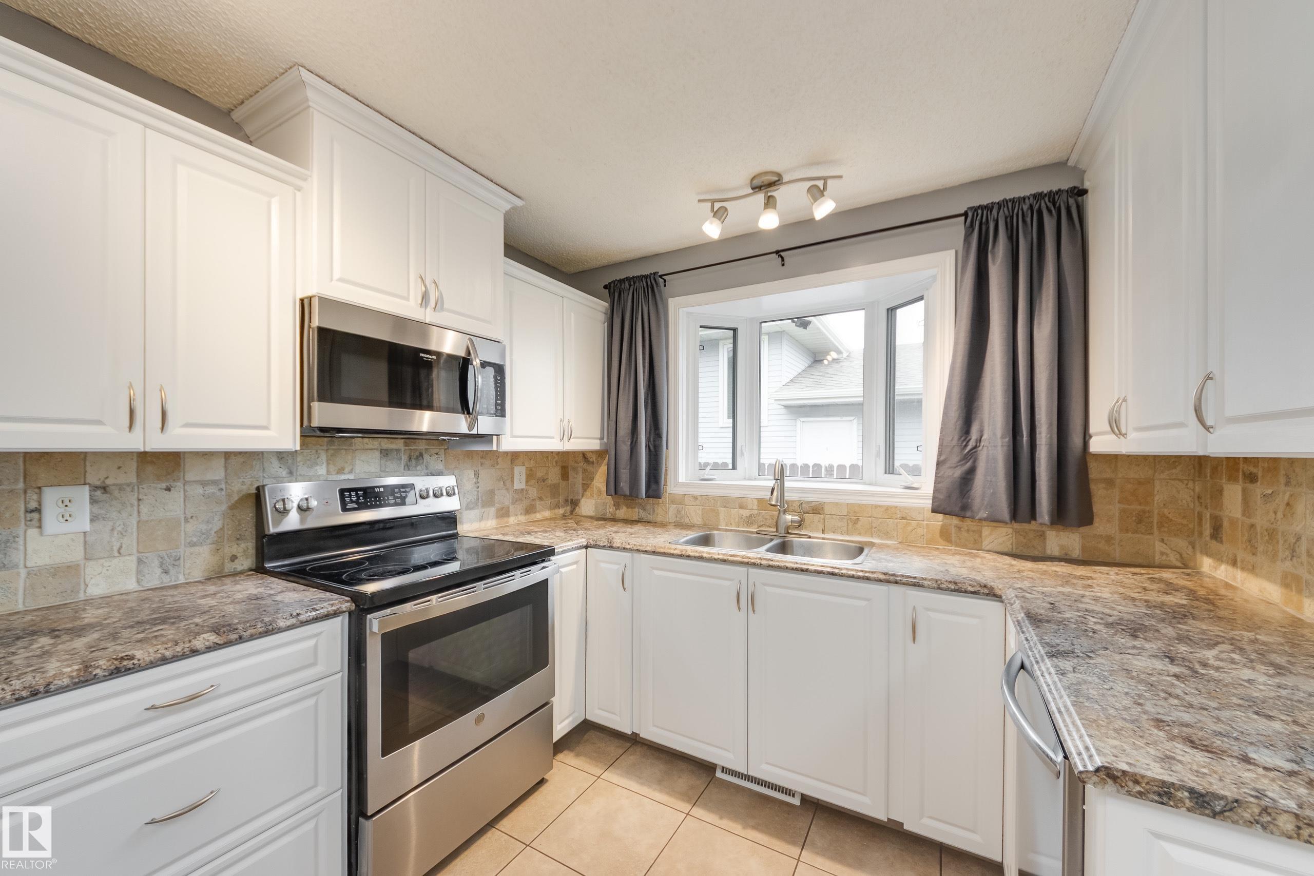 Photo 10 at 14615 29a Street NW, Kirkness, Edmonton