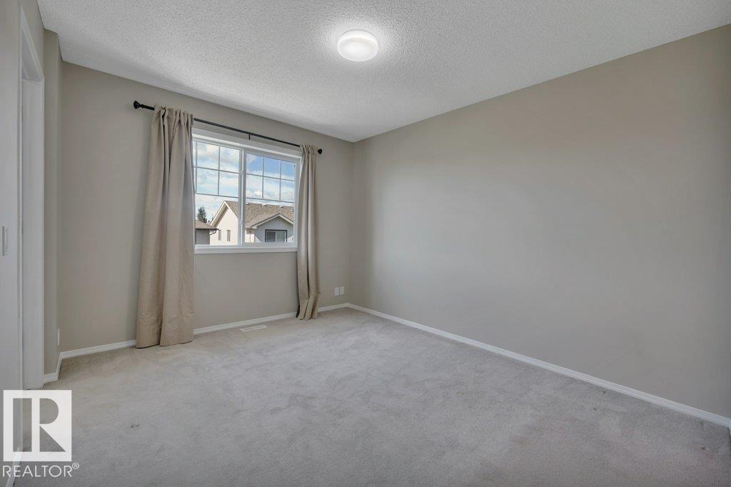 Photo 14 at 73 - 5604 199 Street NW, The Hamptons, Edmonton