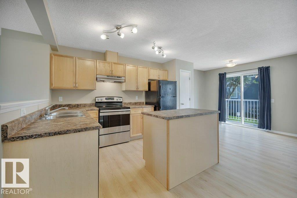 Photo 6 at 73 - 5604 199 Street NW, The Hamptons, Edmonton