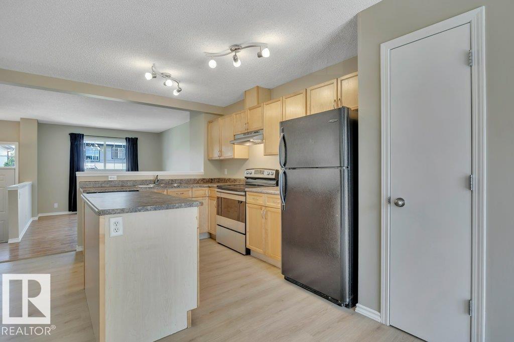 Photo 10 at 73 - 5604 199 Street NW, The Hamptons, Edmonton