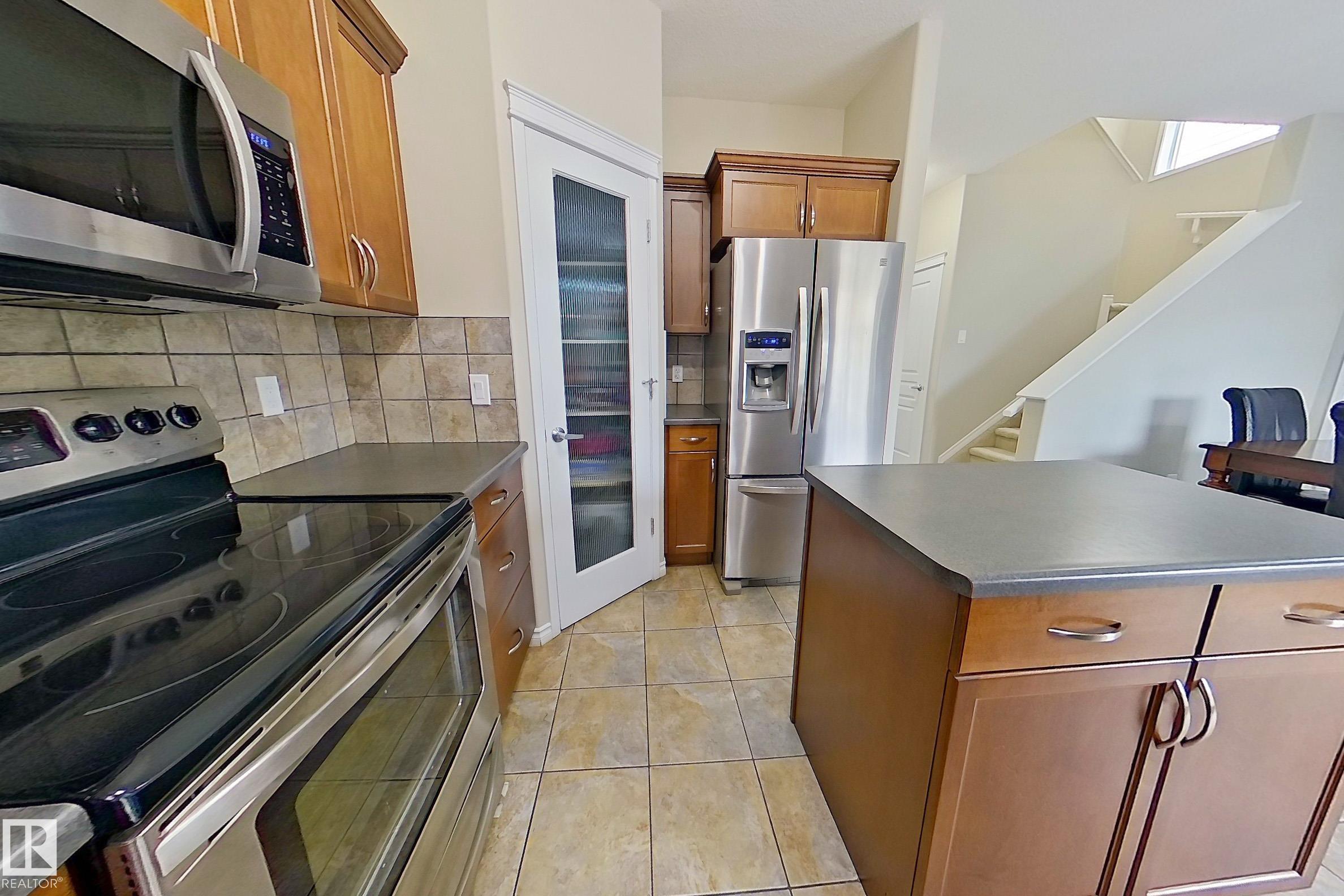 Photo 15 at 21308 58 Avenue NW, The Hamptons, Edmonton