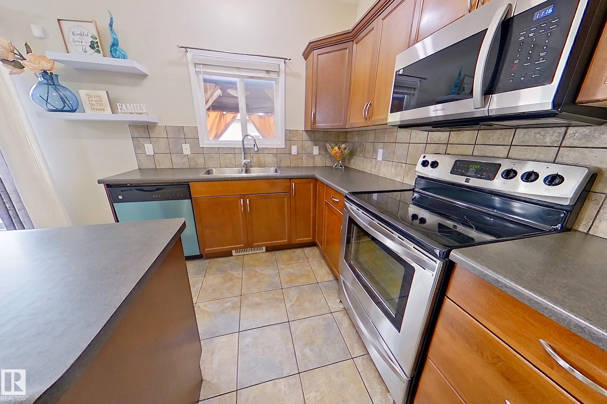 Photo 17 at 21308 58 Avenue NW, The Hamptons, Edmonton