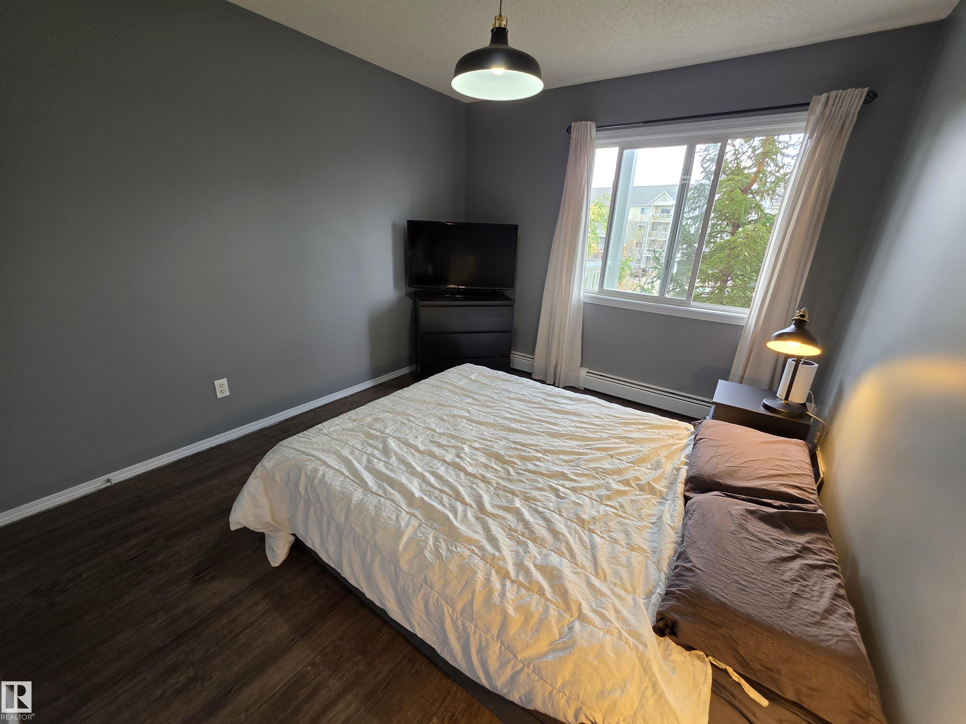 Photo 26 at 319 - 70 Woodsmere, Westpark, Fort Saskatchewan