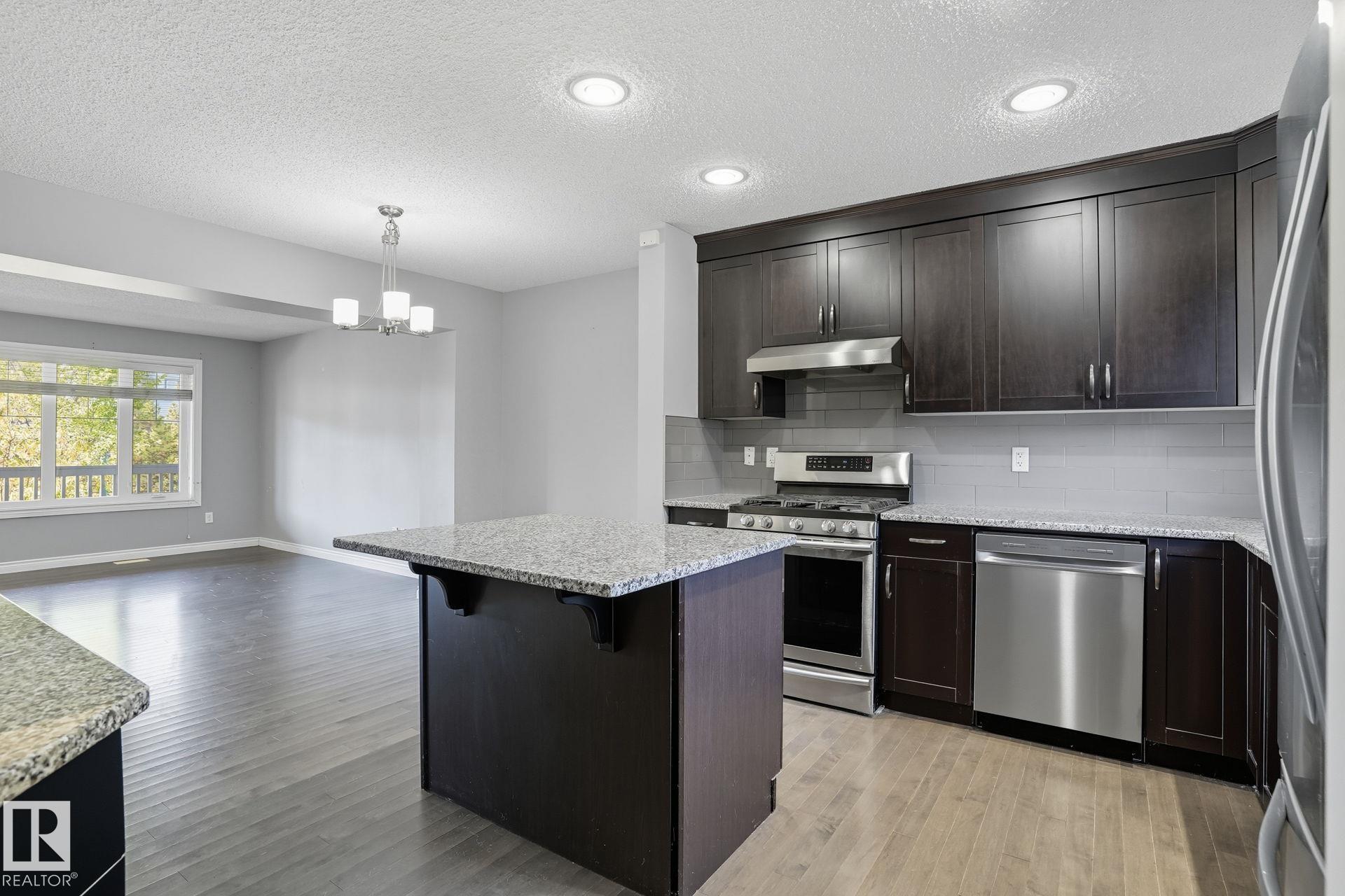 Photo 15 at 1565 33a Street NW, Laurel, Edmonton