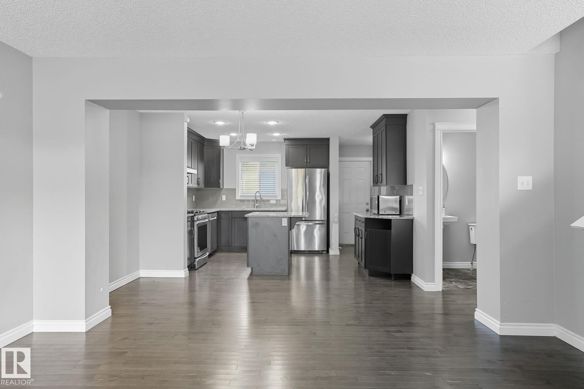 Photo 10 at 1565 33a Street NW, Laurel, Edmonton