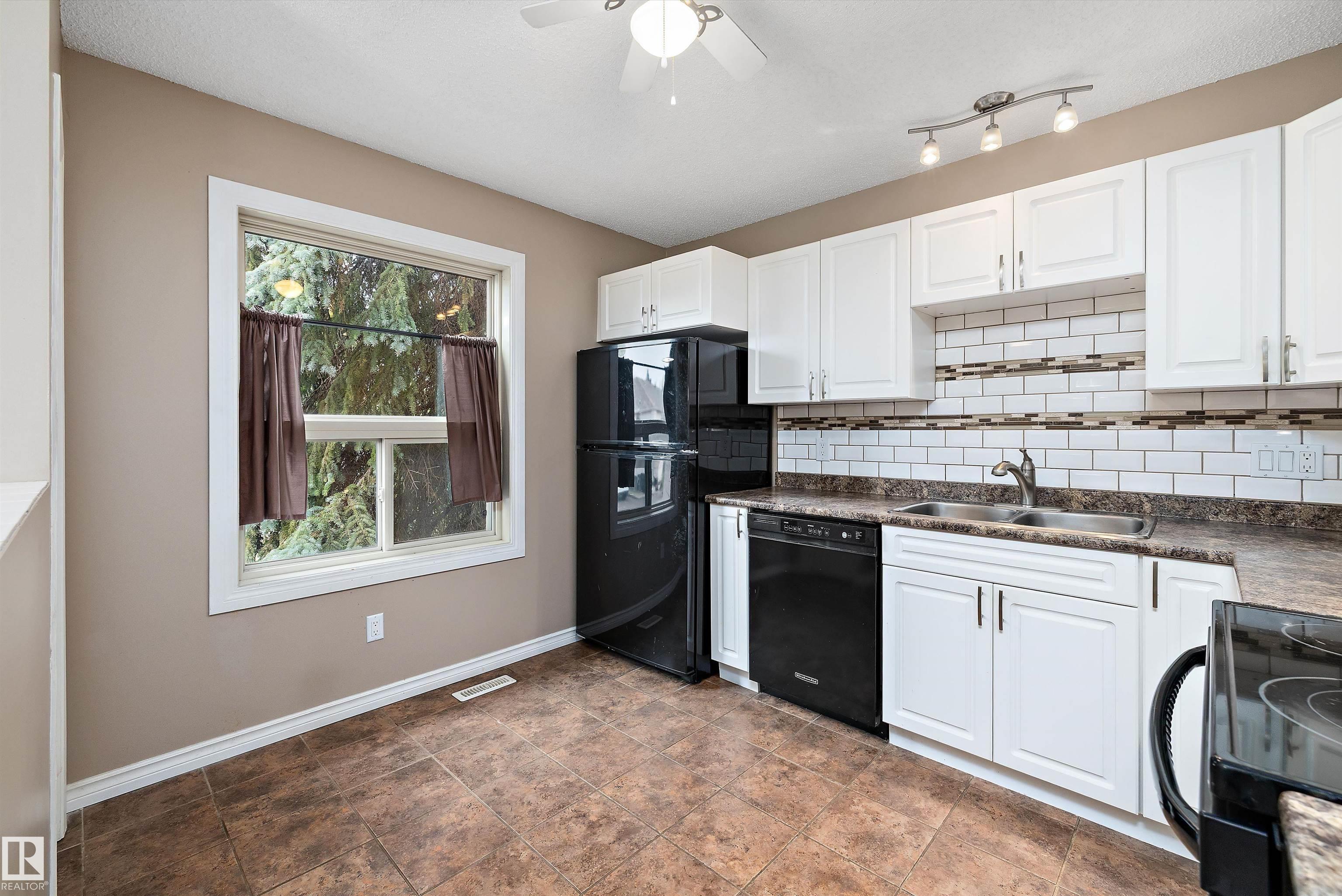 Photo 17 at 1821 Mill Woods Road E NW, Daly Grove, Edmonton