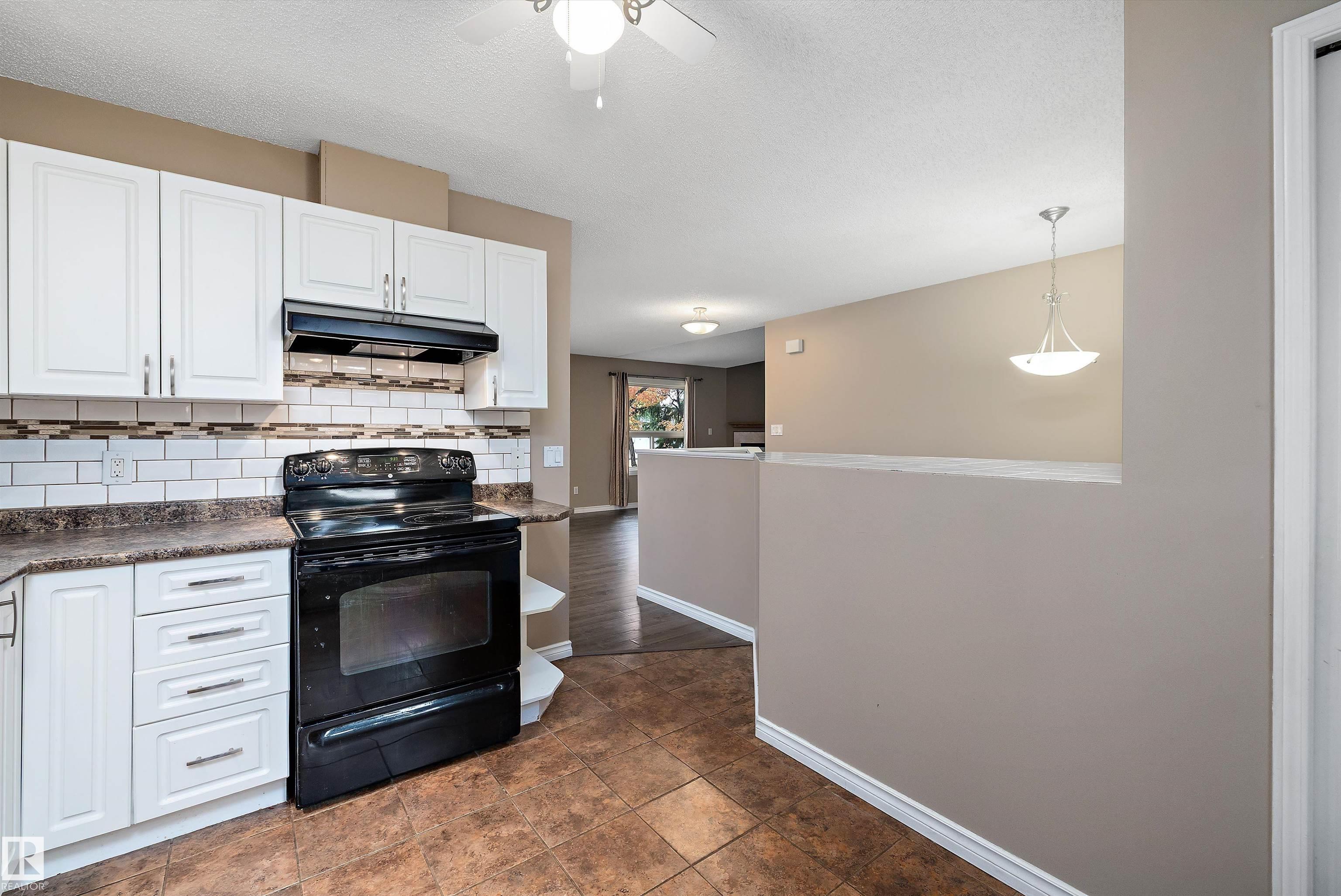 Photo 19 at 1821 Mill Woods Road E NW, Daly Grove, Edmonton