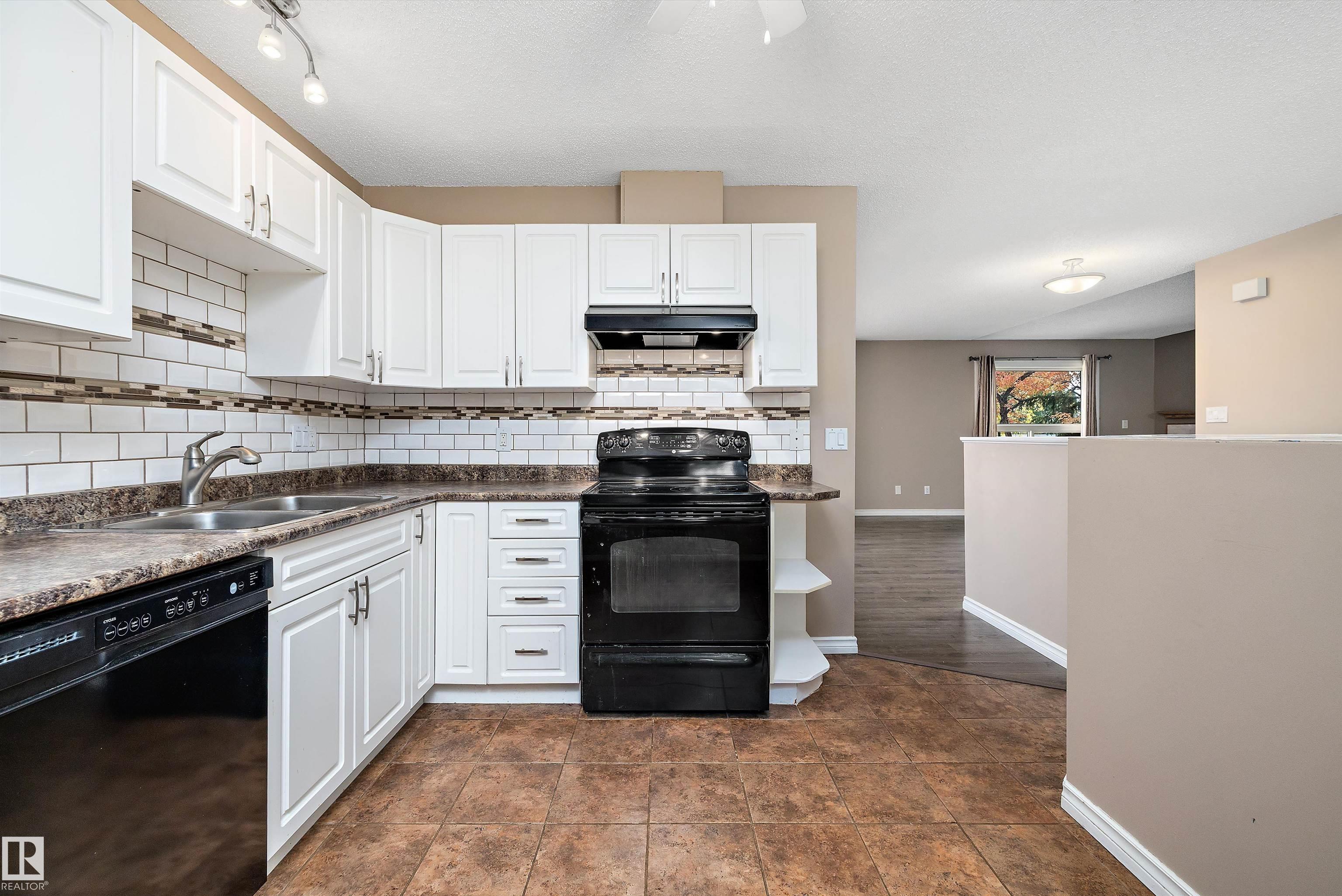 Photo 20 at 1821 Mill Woods Road E NW, Daly Grove, Edmonton