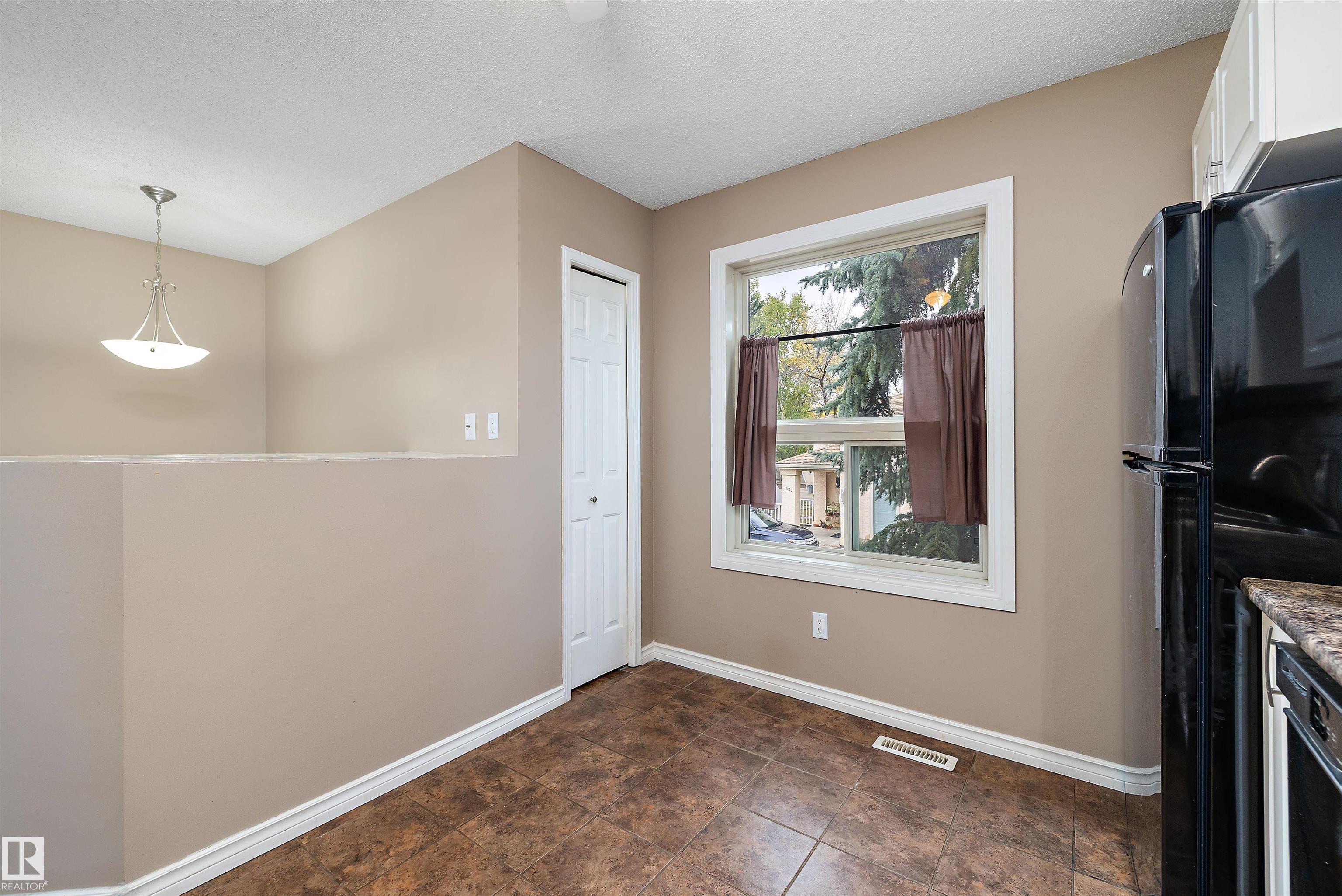 Photo 21 at 1821 Mill Woods Road E NW, Daly Grove, Edmonton