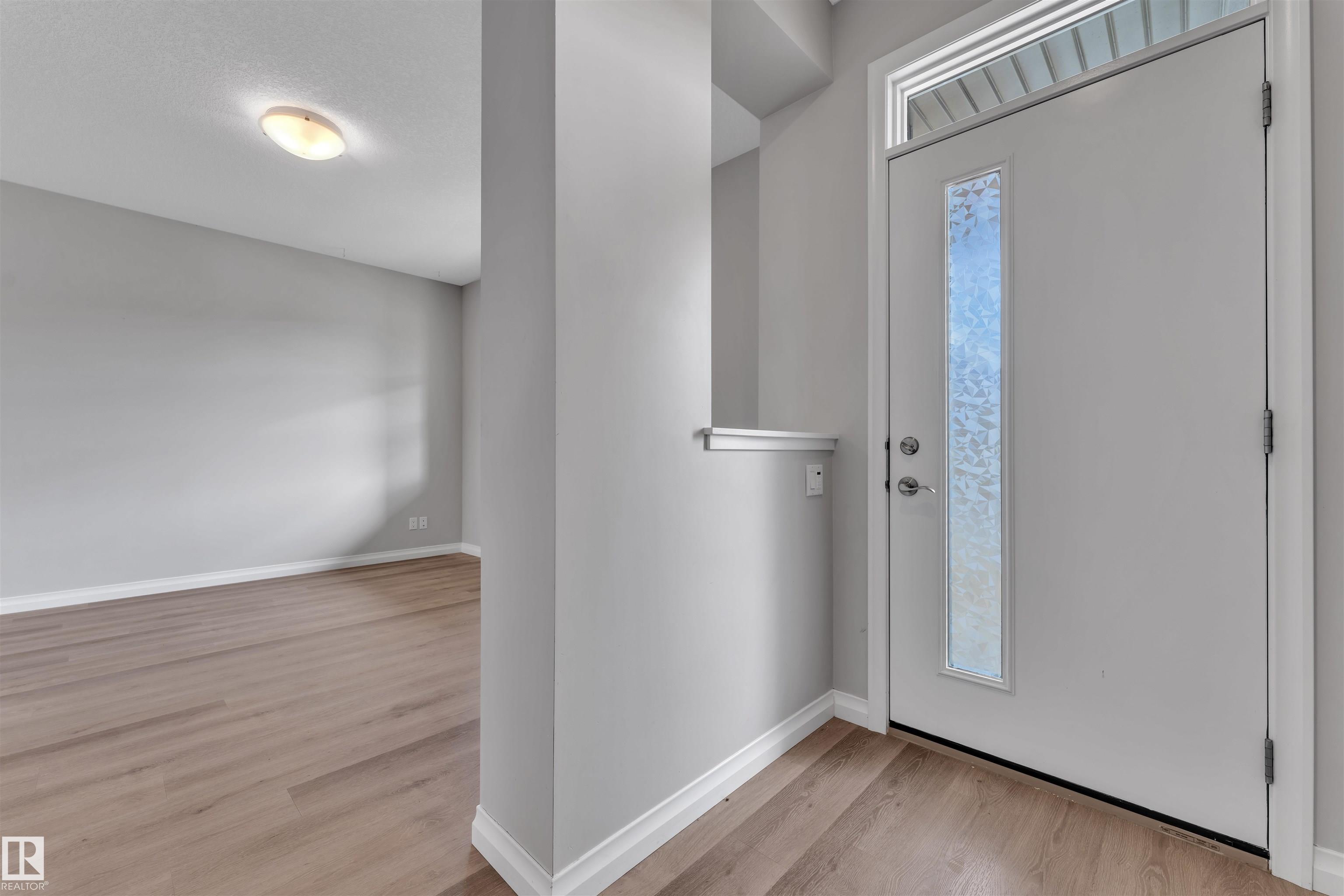 Photo 6 at 176 Charlesworth Drive SW, Charlesworth, Edmonton