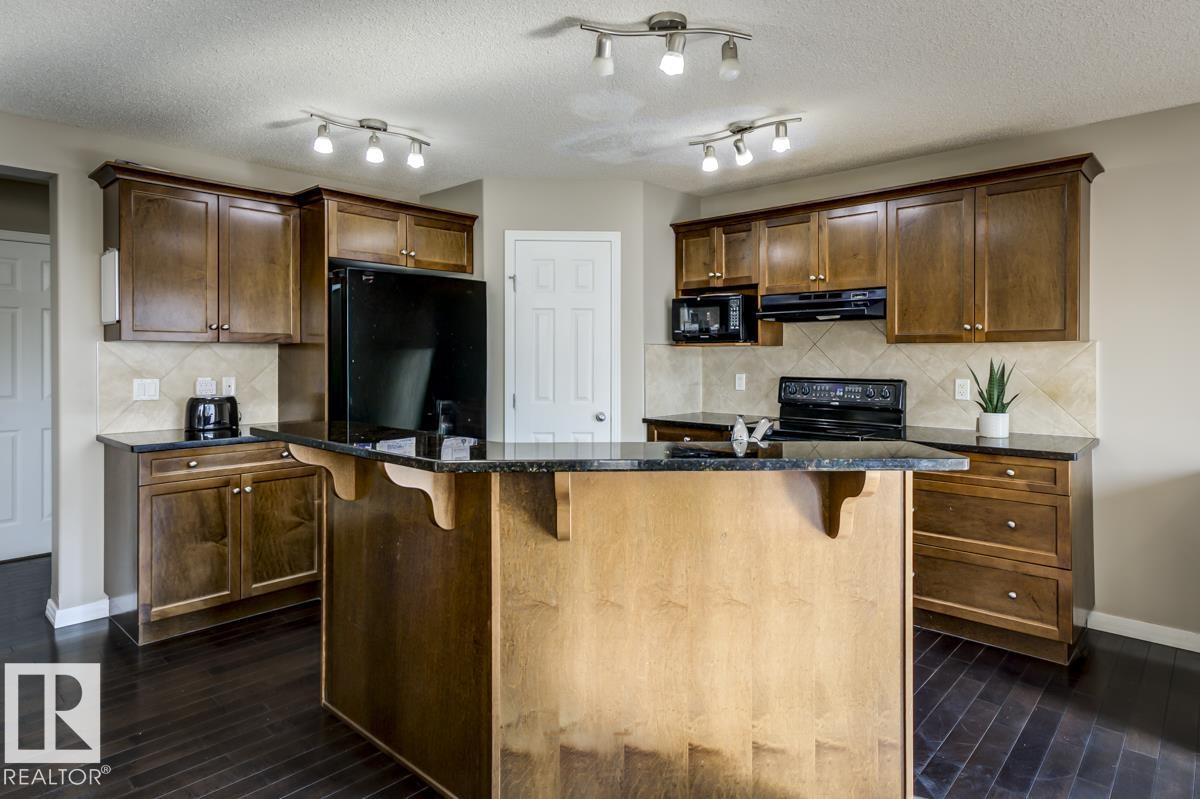 Photo 11 at 5823 7 Avenue SW, Charlesworth, Edmonton
