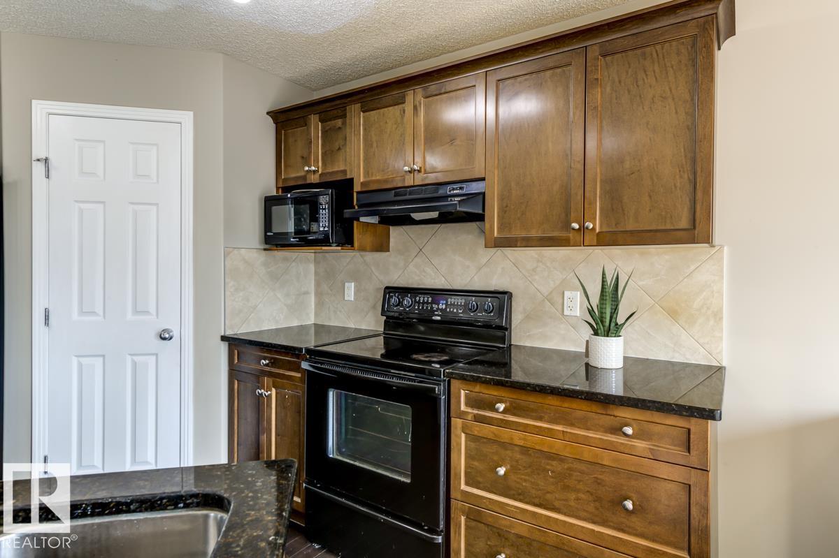Photo 12 at 5823 7 Avenue SW, Charlesworth, Edmonton