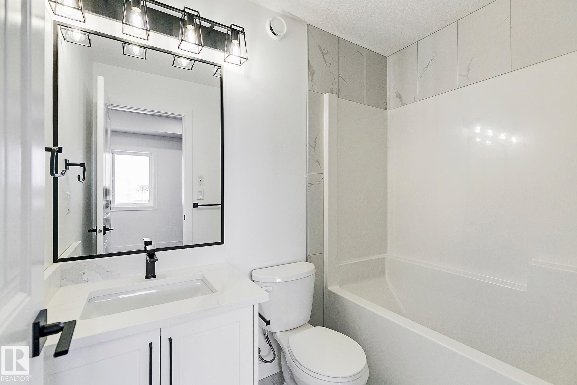 Photo 17 at 9829 107a Avenue, Champagne, Morinville