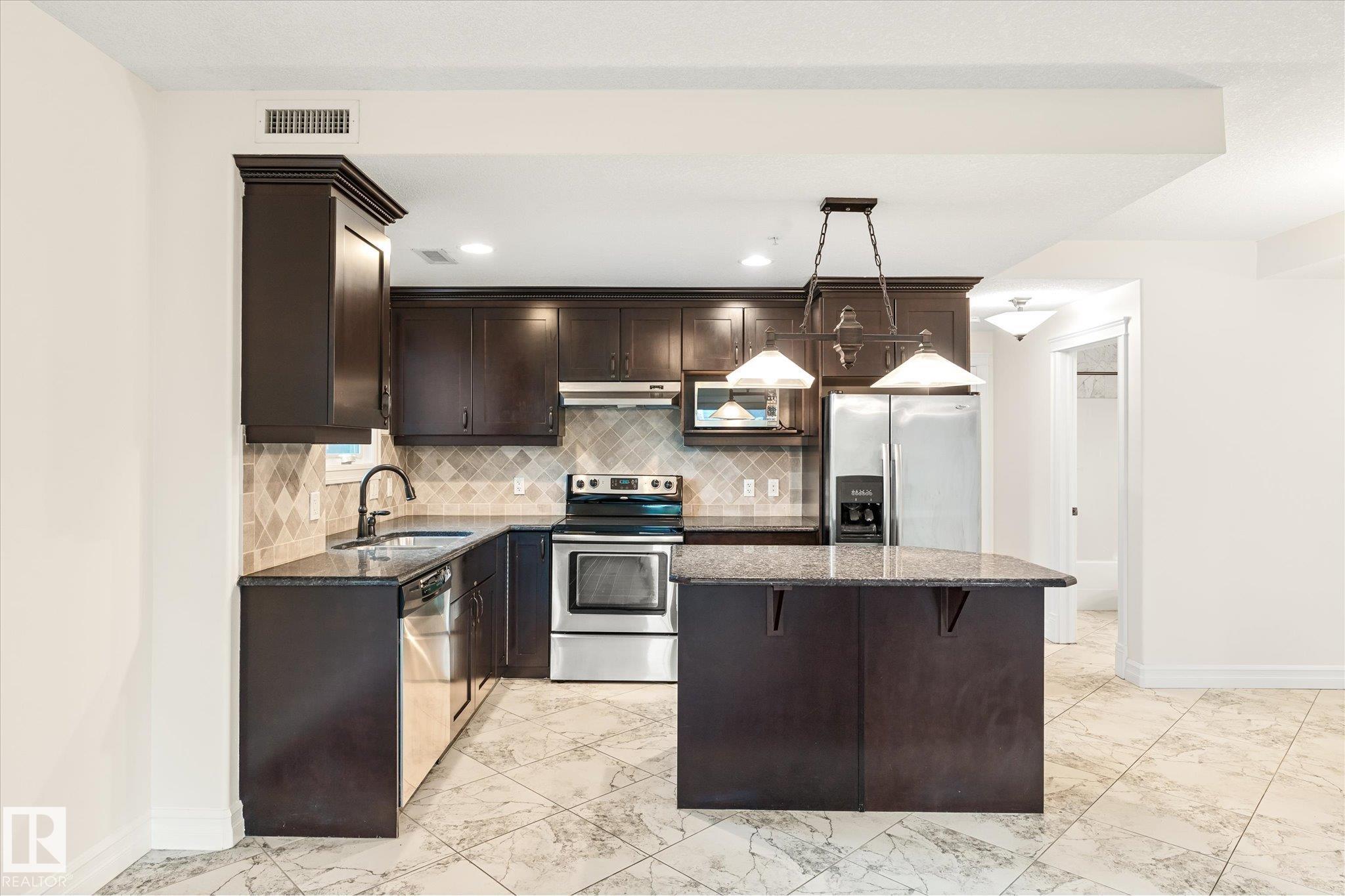Photo 15 at 304 - 10142 111 Street NW, Wîhkwêntôwin, Edmonton