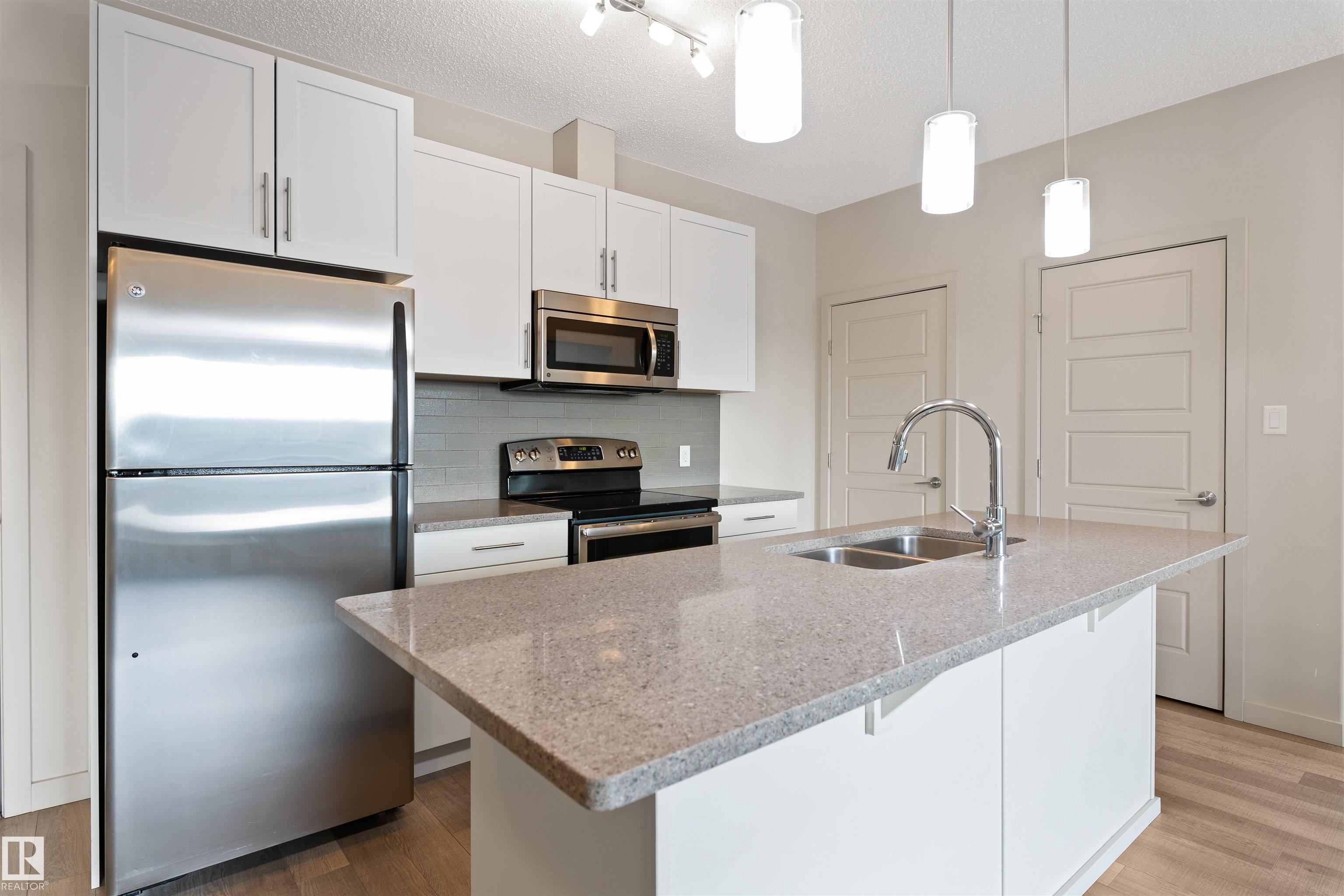 Photo 3 at 416 - 1144 Adamson Drive SW, Allard, Edmonton