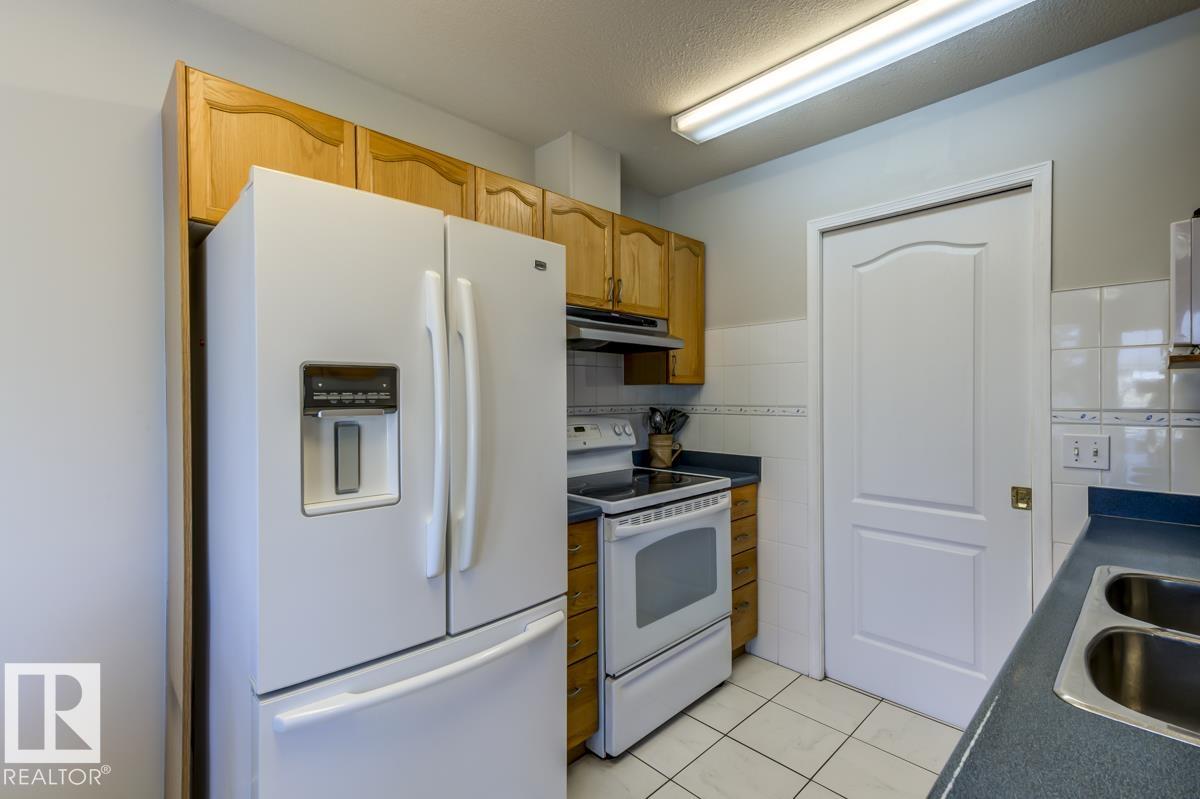 Photo 13 at 20 - 13320 124 Street NW, Kensington, Edmonton