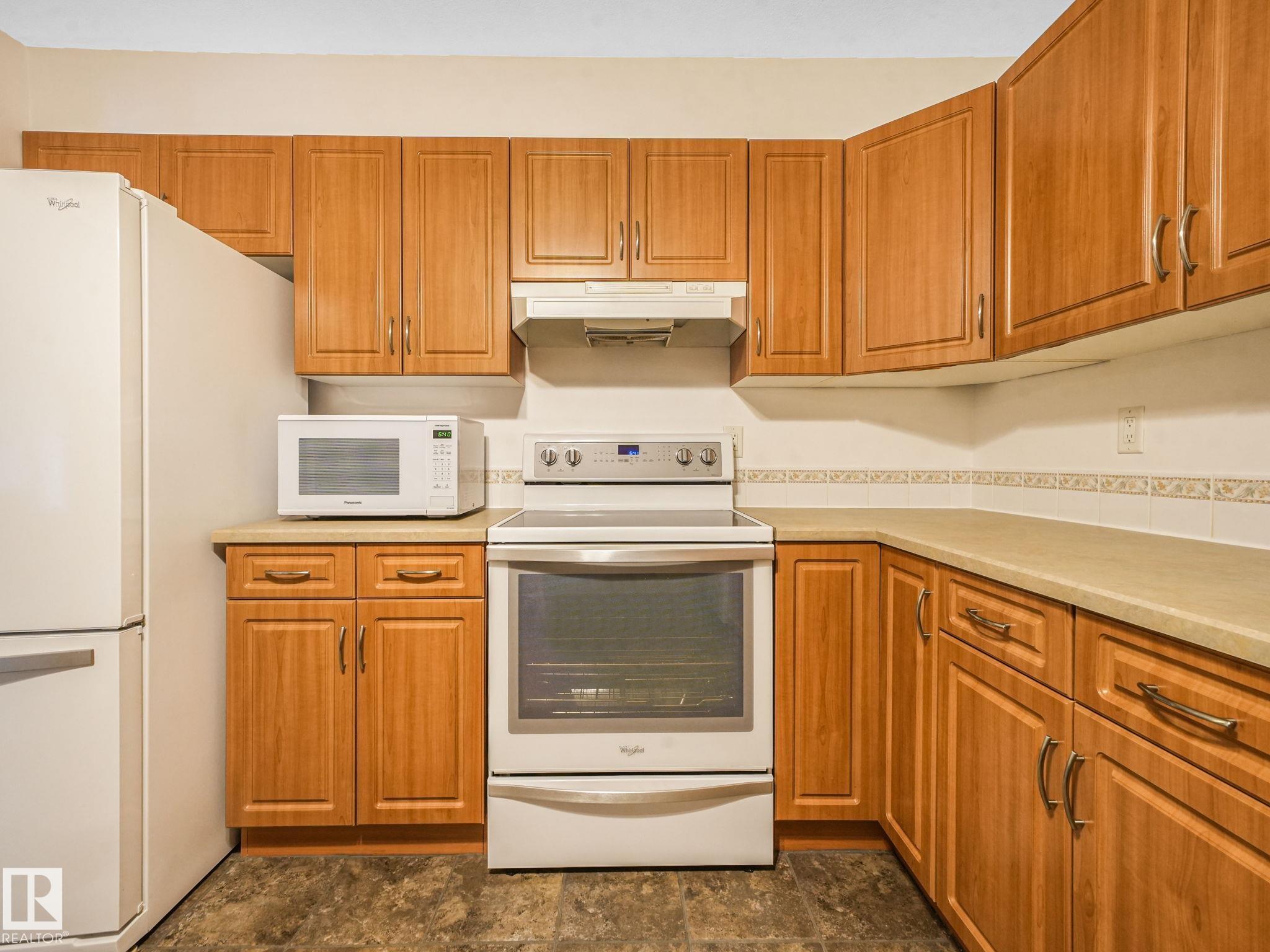 Photo 10 at 211 - 6220 Fulton Road NW, Fulton Place, Edmonton