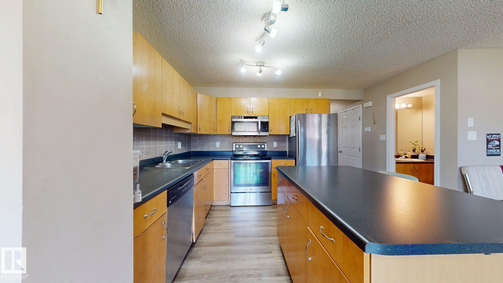 Photo 19 at 1150 37b Avenue NW, Tamarack, Edmonton