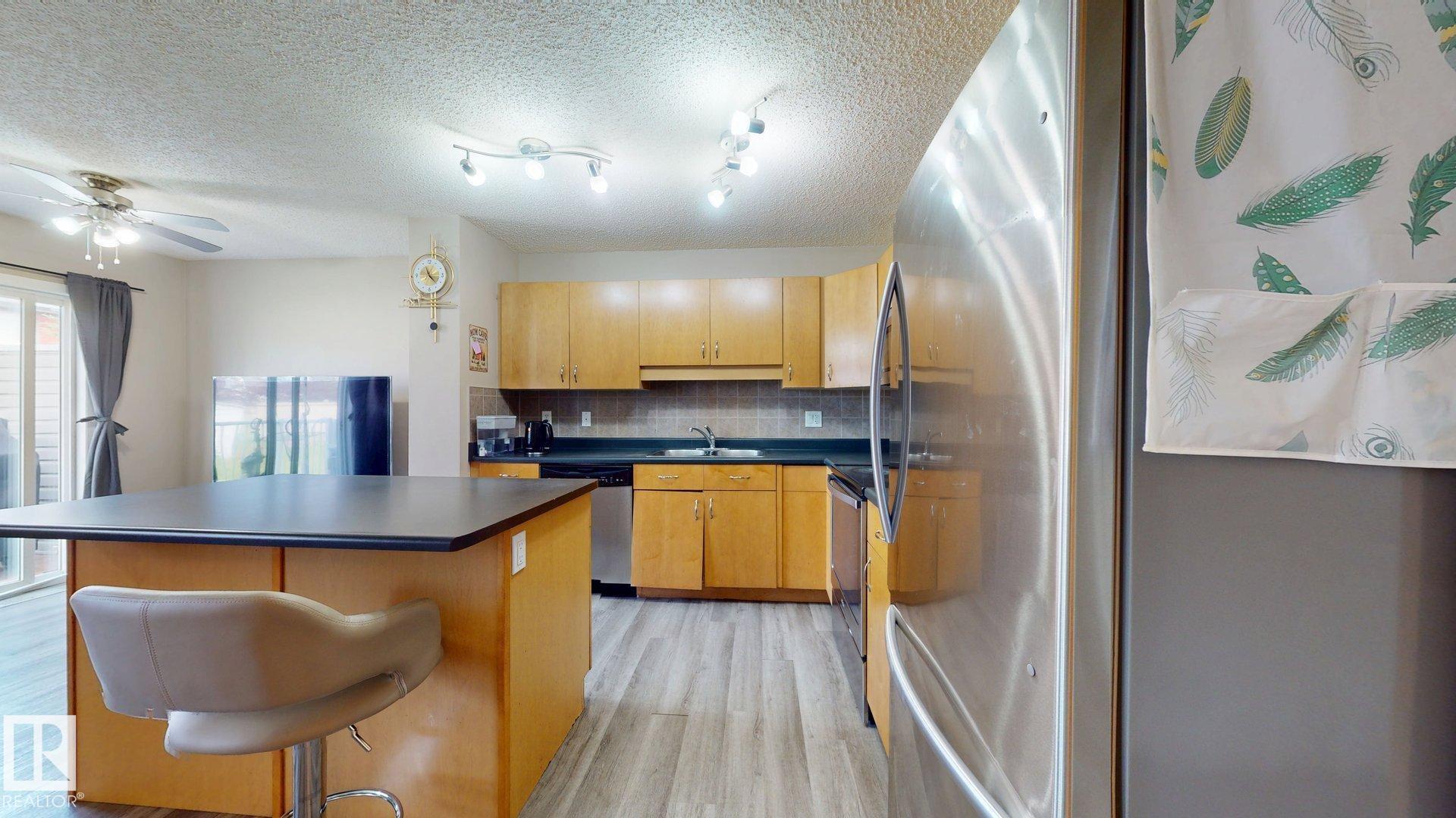 Photo 5 at 1150 37b Avenue NW, Tamarack, Edmonton
