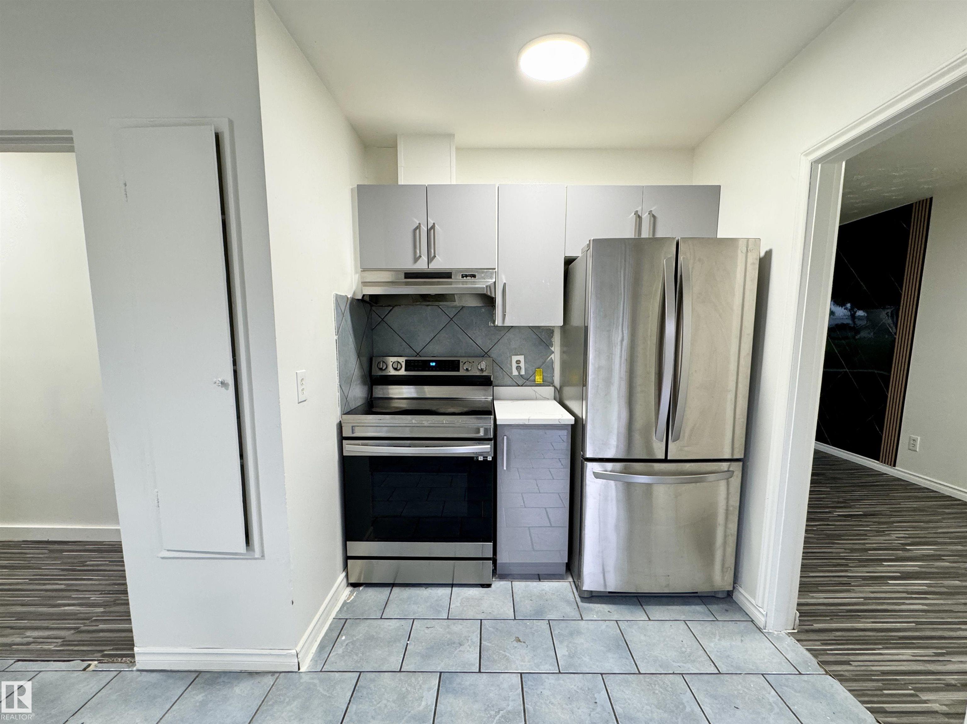 Photo 11 at 16415 106 Avenue NW, Britannia Youngstown, Edmonton